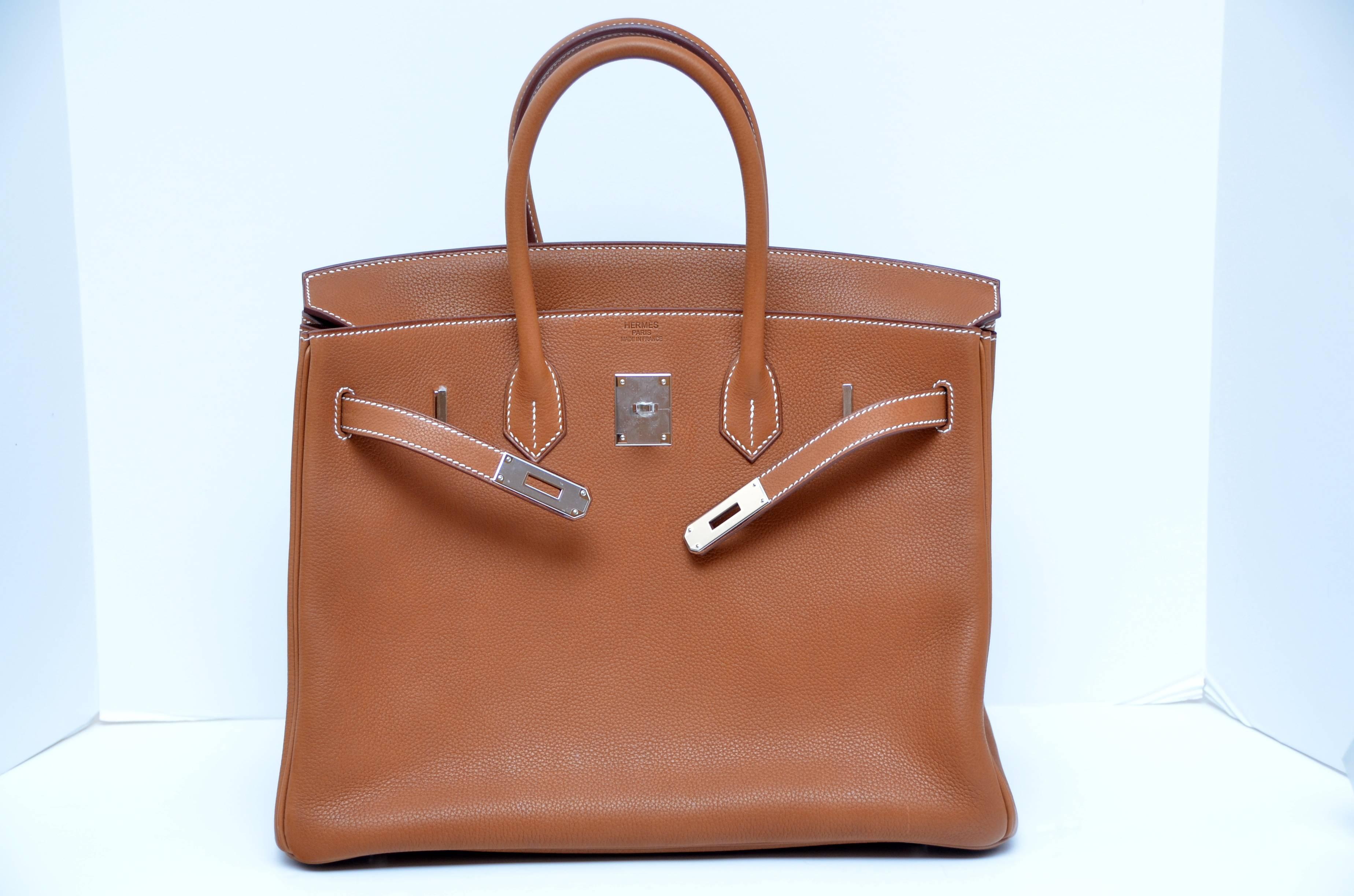 
Guaranteed Authentic highly sought after Hermes 35 Birkin very rare Barenia Faubourg. 
Finish and texture on Barenia requires a highly specialized oiling process by Hermes and because of this unique special leather price is higher that some other