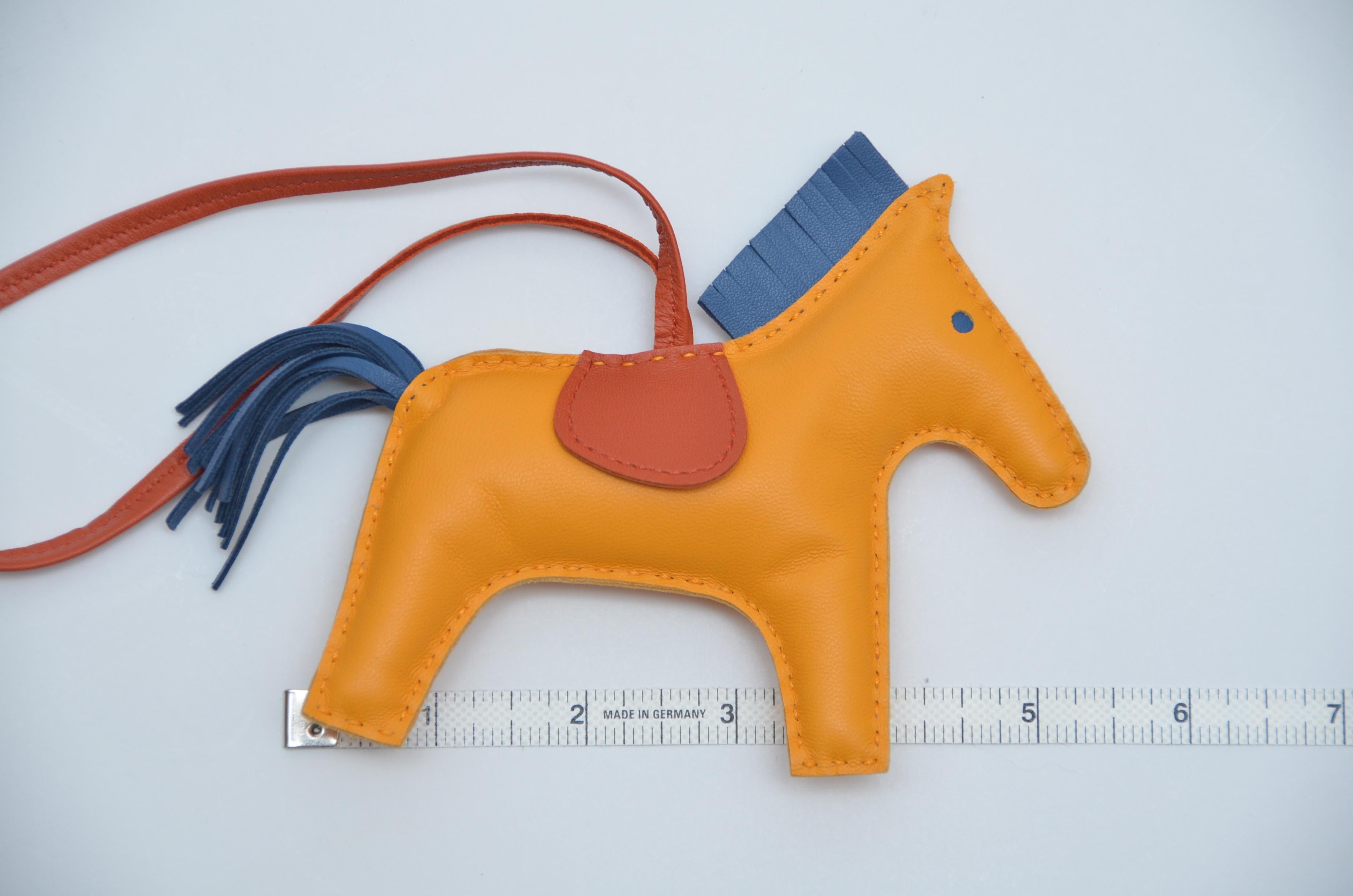 Hermes Rodeo Bag Charm GM Jaune Blue Bleu Rodeo Horse  
NEW with Hermes box.
Made in France


FINAL SALE.