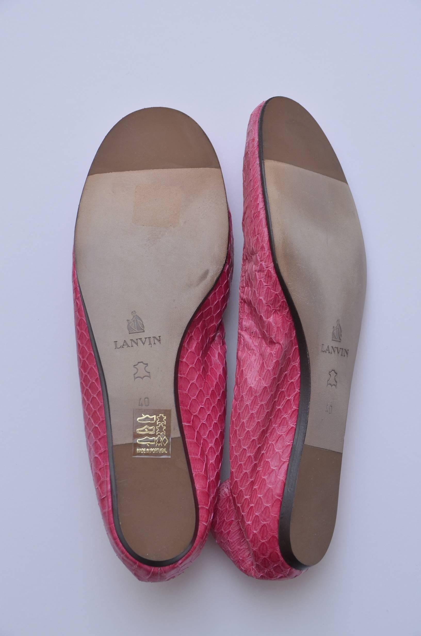 Lanvin new flats.
Snakeskin pink color.
They run small.Bottom outside measure about 10
