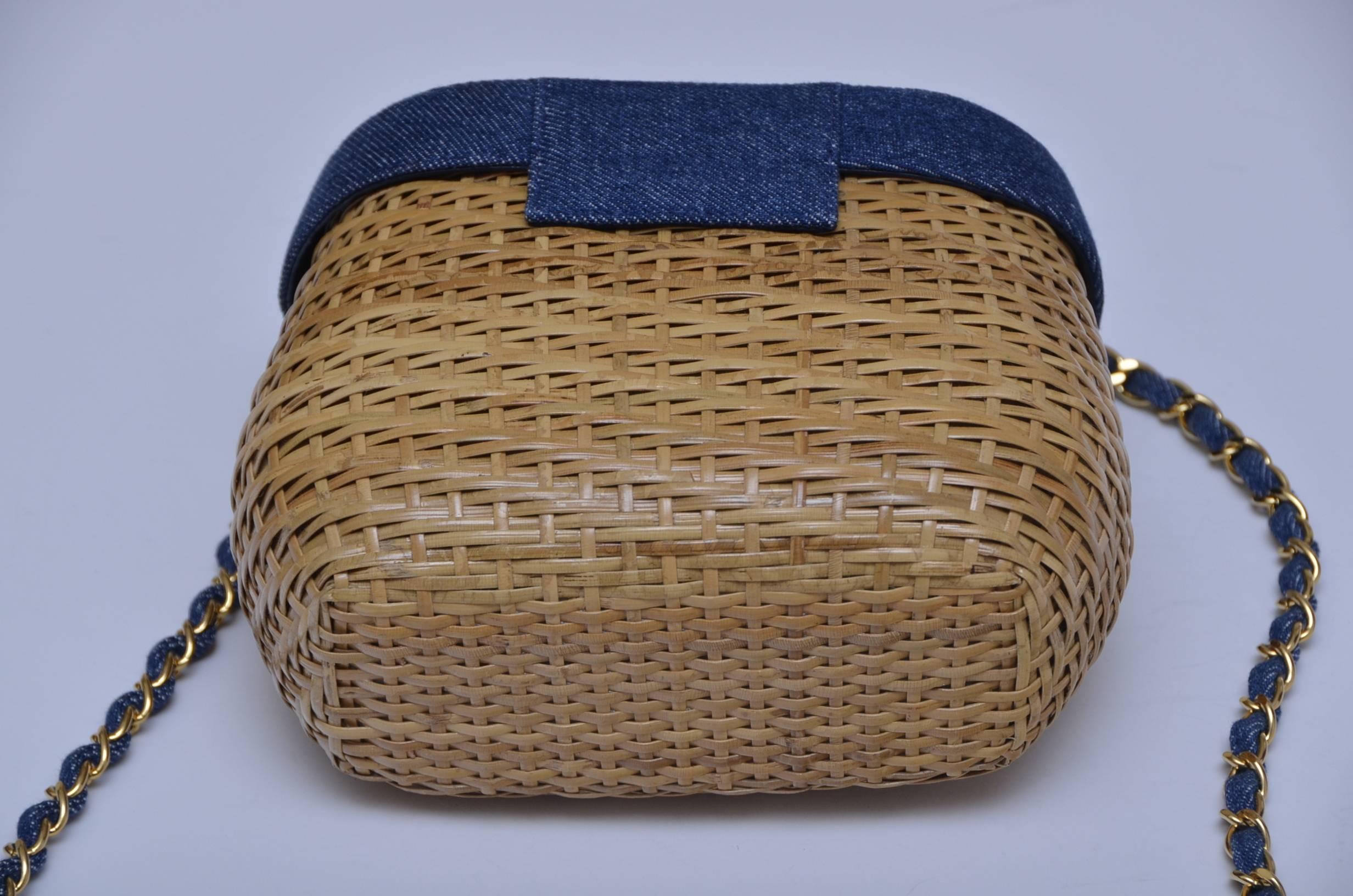 Vintage rare  denim top Chanel wicker handbag.
Excellent mint clean inside out condition.
Comes with a little booklet and card.No dust bag or box.
Very collectible beautiful Chanel handbag and hard to find in this mint condition.Gold tone