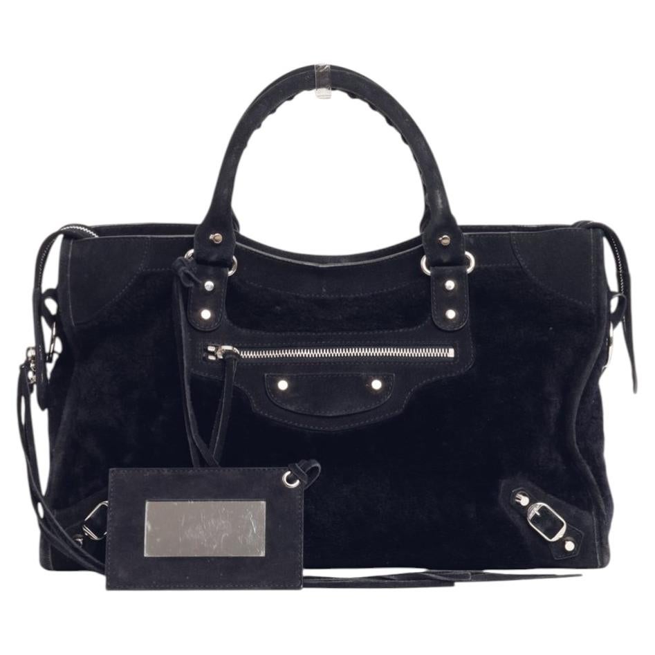 How do I shorten a Balenciaga bag strap?