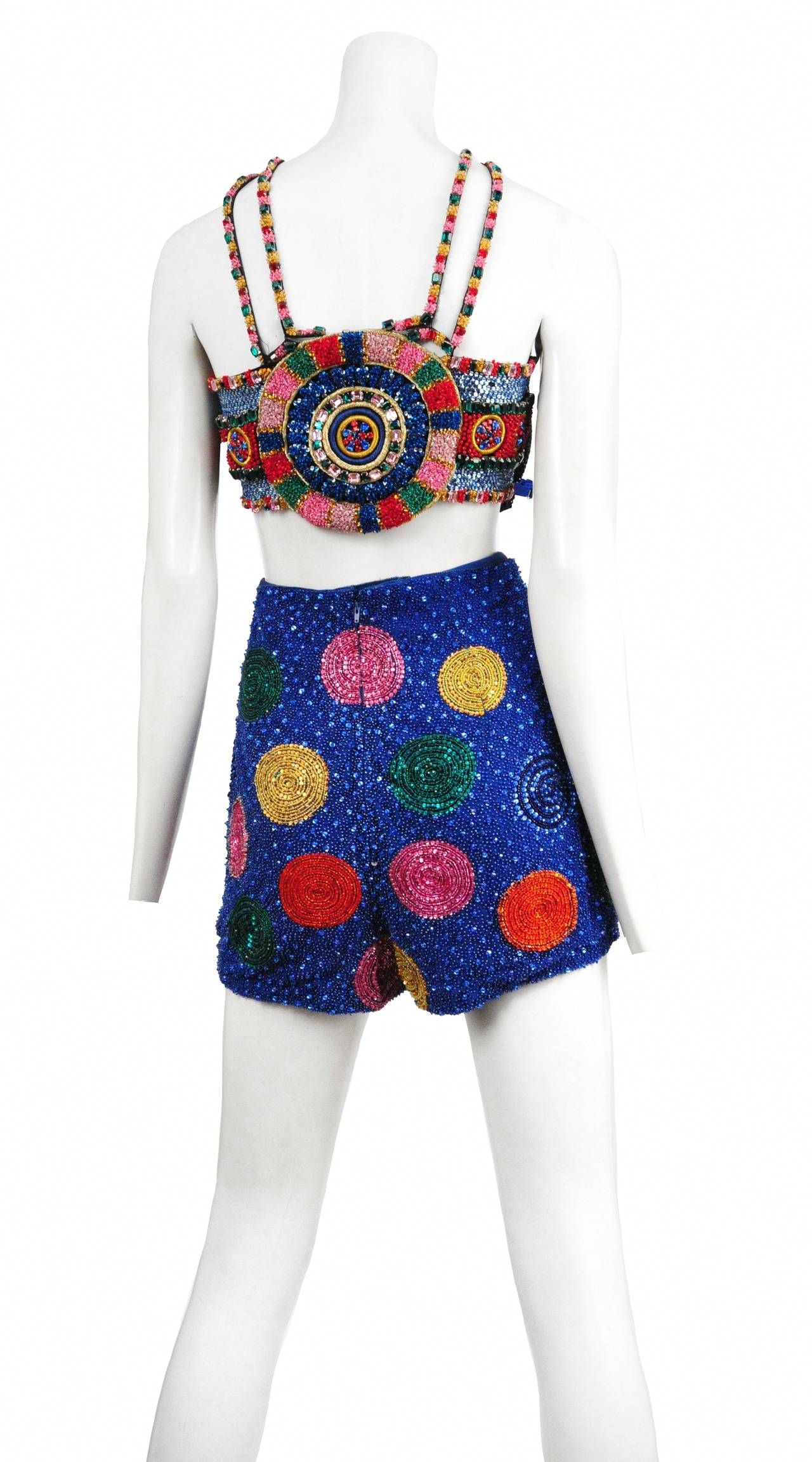 Vintage Gianni Versace fully encrusted beaded phoenix top and corresponding beaded high waisted shorts.
