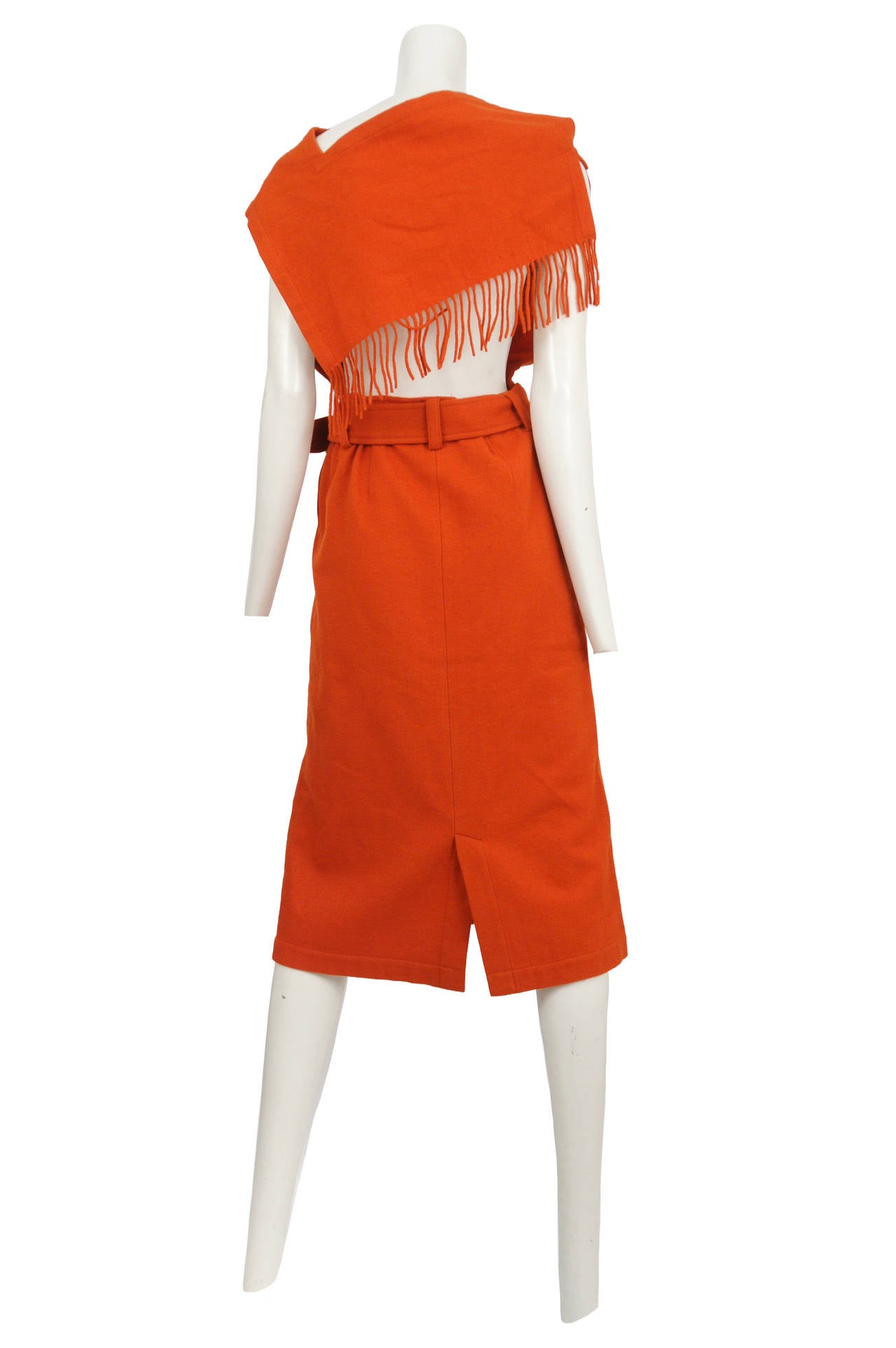 Comme des Garcons burnt orange scarf inspired backless dress with matching belt. The back of this dress is completely open suggesting a flat apron. Circa 1989.