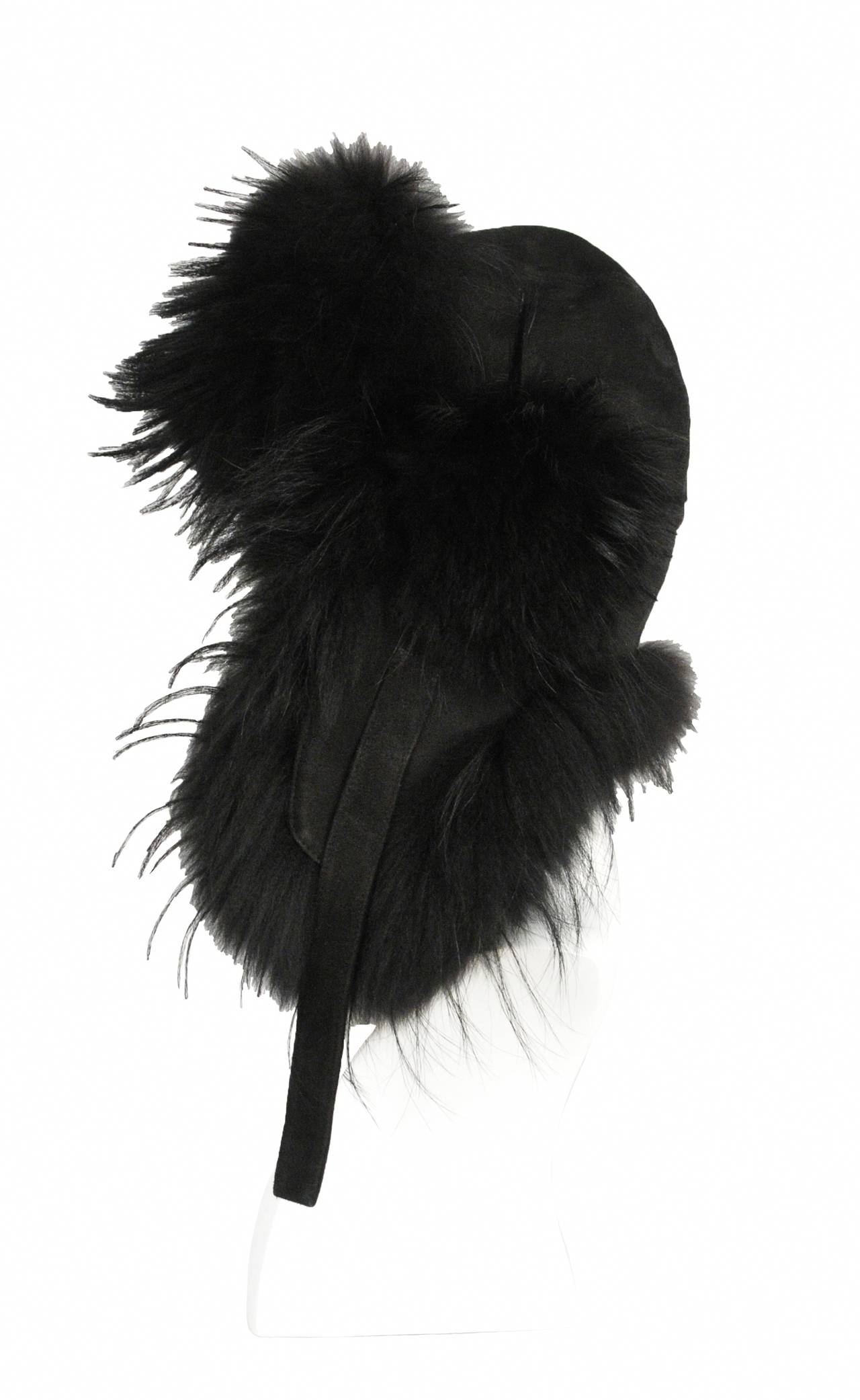 Chanel black suede and black fur aviator apres ski hat. Lined in black silk satin. Tie front and 
