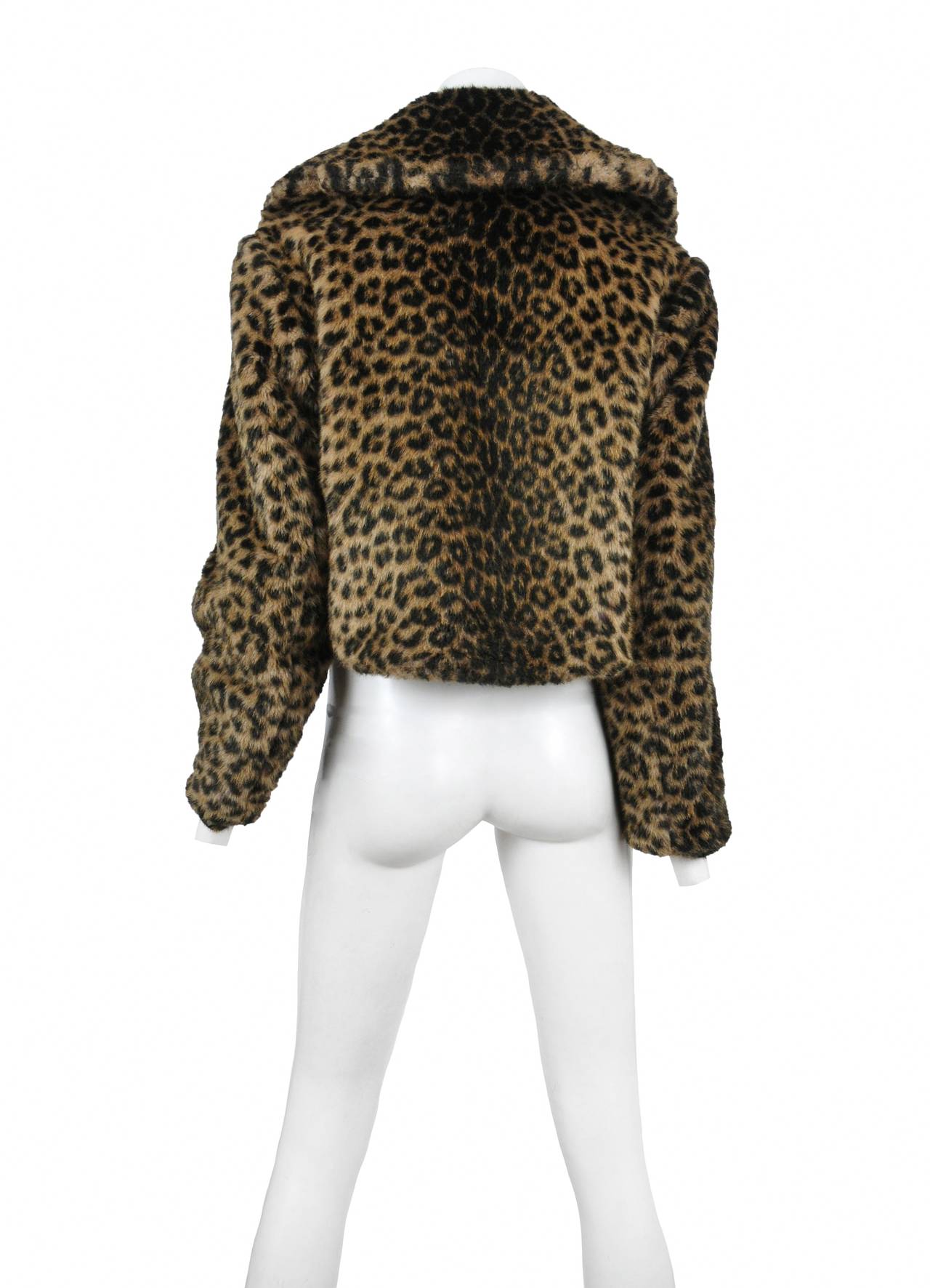 Vintage Alaia faux leopard cropped coat with wide lapel and black frog closure at waist.