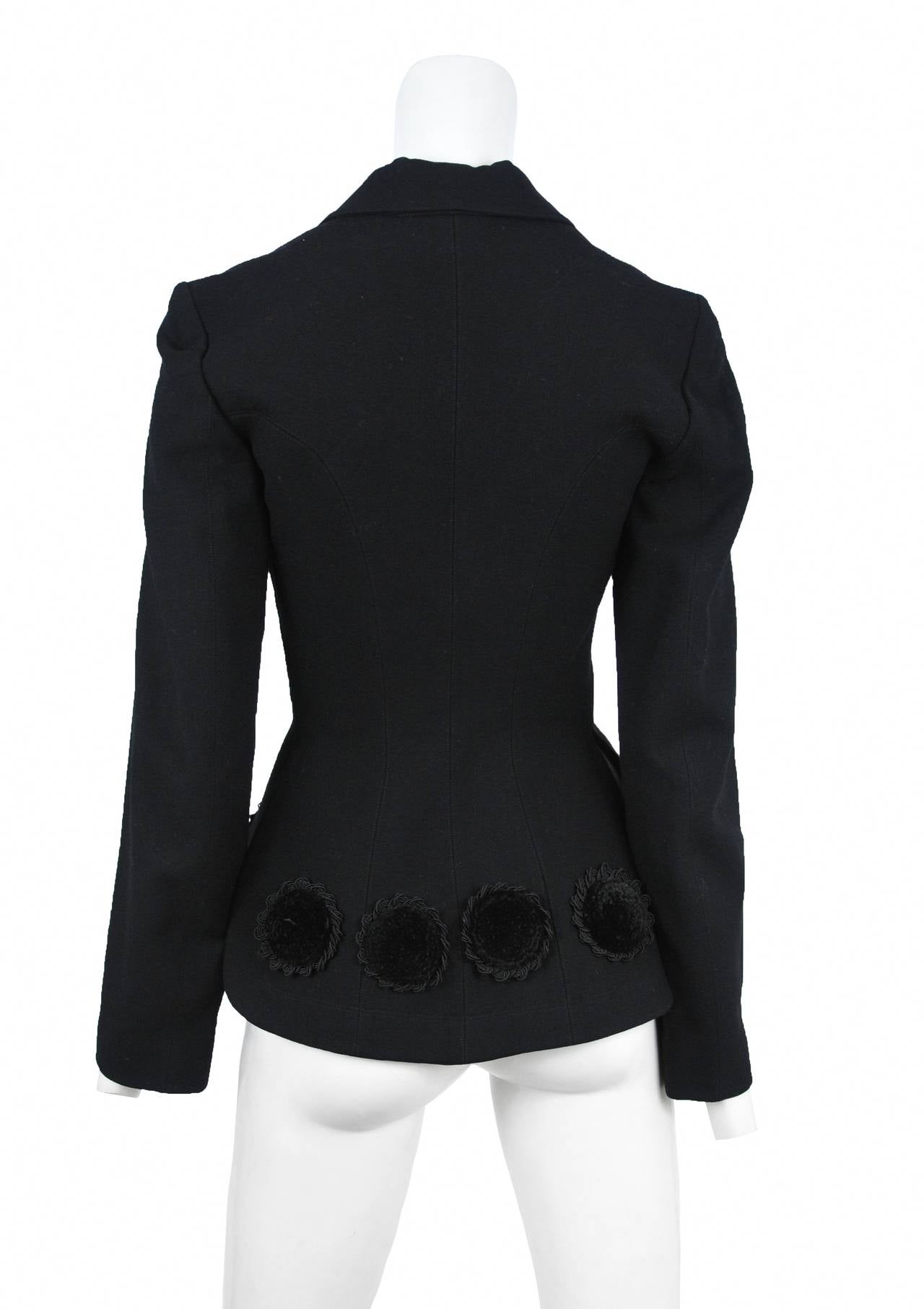 Vintage Alaia black blazer with velvet circle appliques adorning the hem.