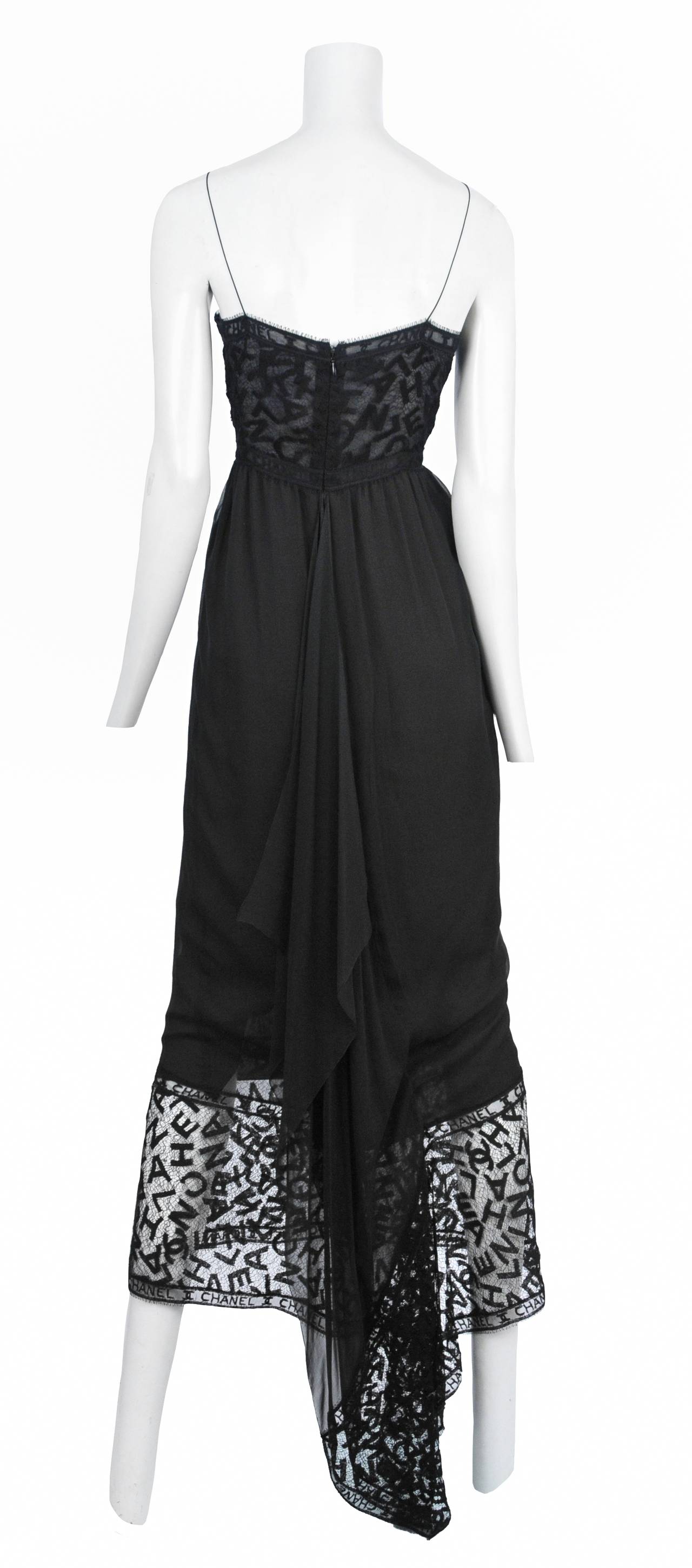 Vintage Chanel black lace chiffon empire dress with slight train and spaghetti straps.