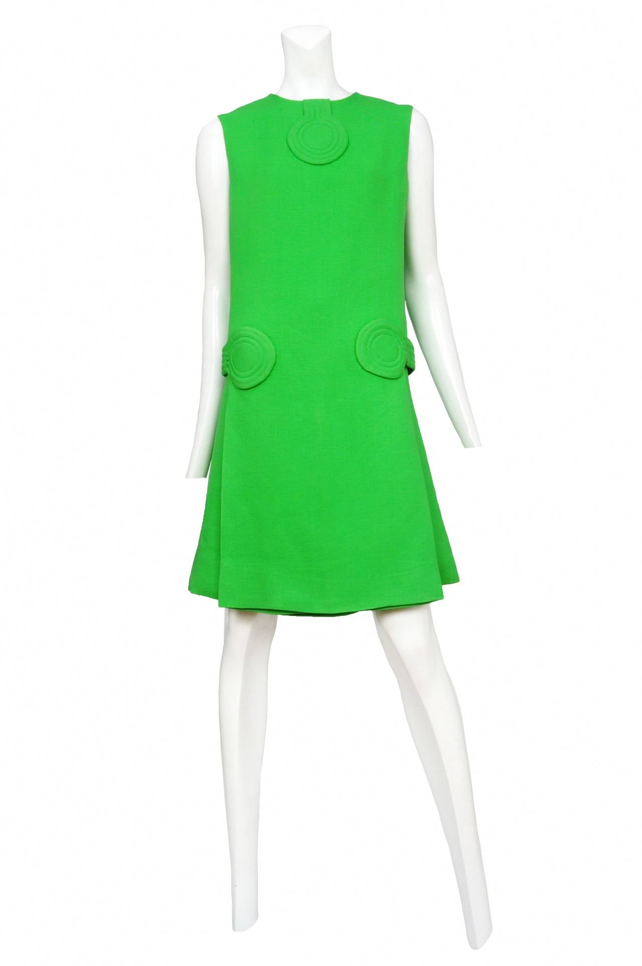 Vibrant kelly green linen day dress. Classic Cardin circles with top stitch detailing.