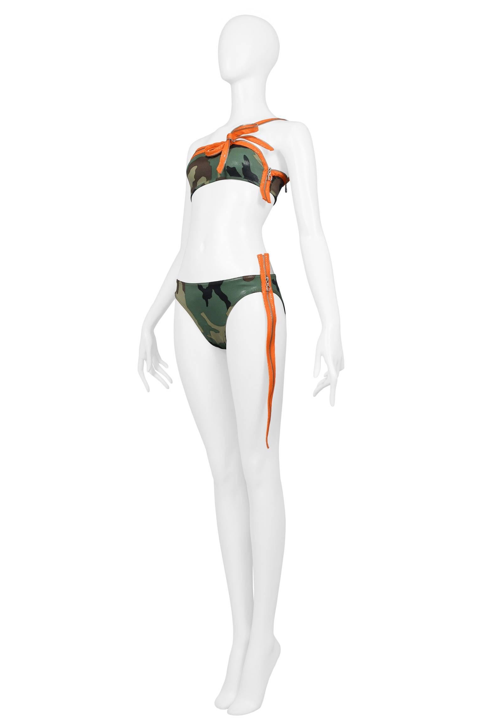 Christian Dior by John Galliano camouflage bikini with orange utility straps with zippers at bust and hip. Never been worn. New Vintage. Featured on the runway and advertising. Collection SS 2001.