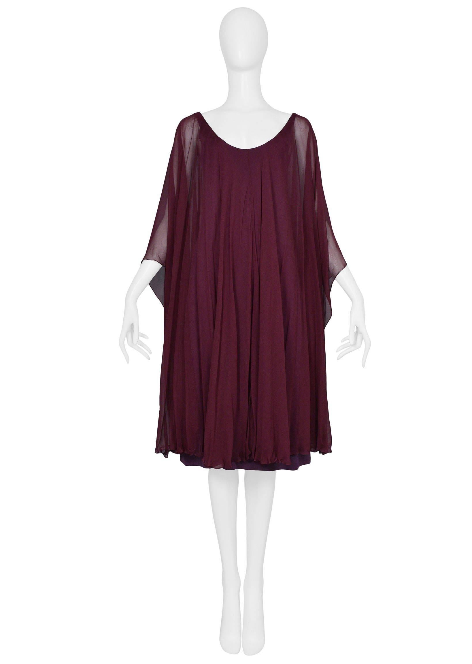 Vintage 1970's original Halston designed berry chiffon mini caftan cocktail dress with butterfly sleeves. Easy open neckline, sheer layer at sleeves, lined dress body. 