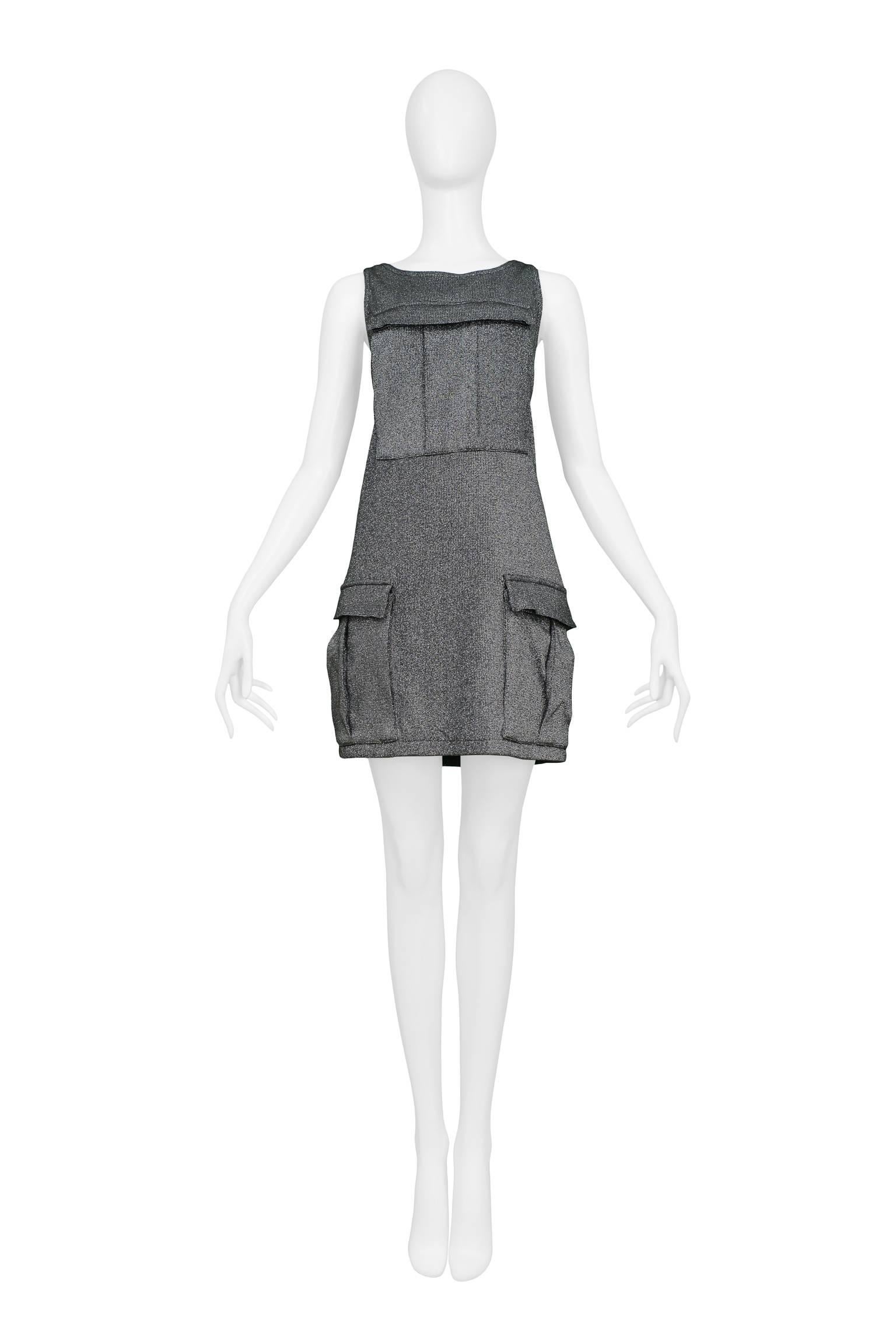 Vintage Stephen Sprouse metallic silver tank dress featuring cargo pockets on the bust and the sides. This dress comes fully lined. 