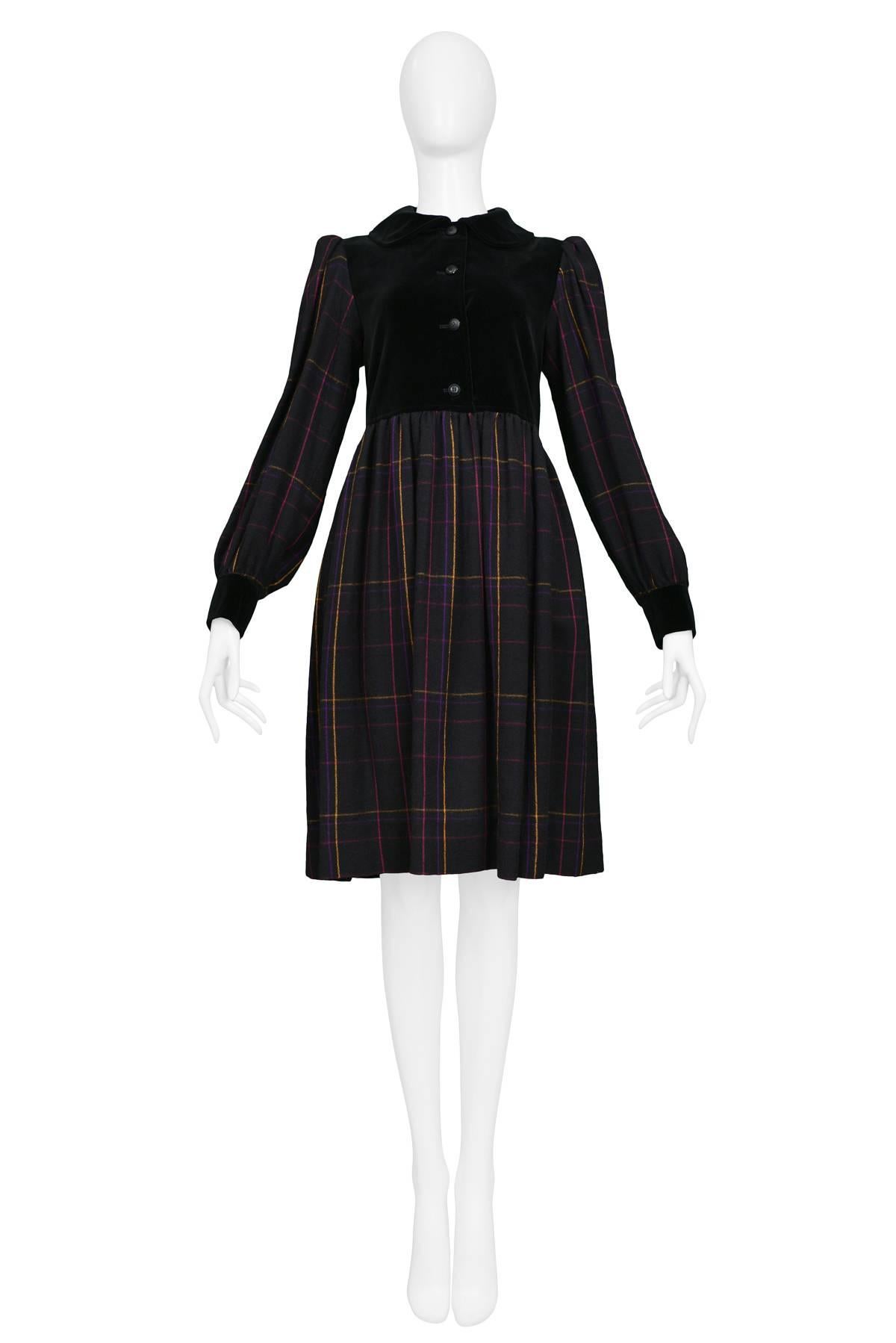 Resurrection Vintage is excited to offer a vintage Yves Saint Laurent black plaid wool dress with magenta, orange, and purple windowpane details. The dress features a black velvet button-front yoke and matching peter pan collar and cuffs. Circa