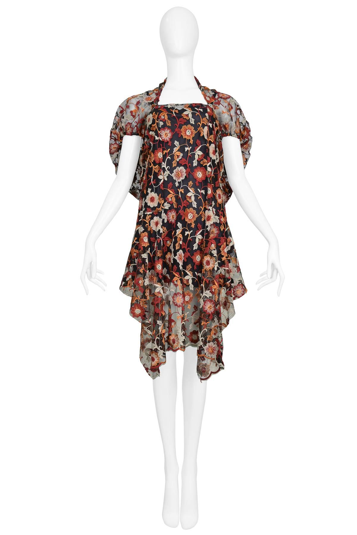 Resurrection Vintage is excited to offer a vintage Junya Watanabe for Comme des Garcons lace tunic top featuring pink and orange floral embroidery, handkerchief hem, square neckline, and cape-like sleeves. 

Junya Watanabe
Size: XS
Lace
2011