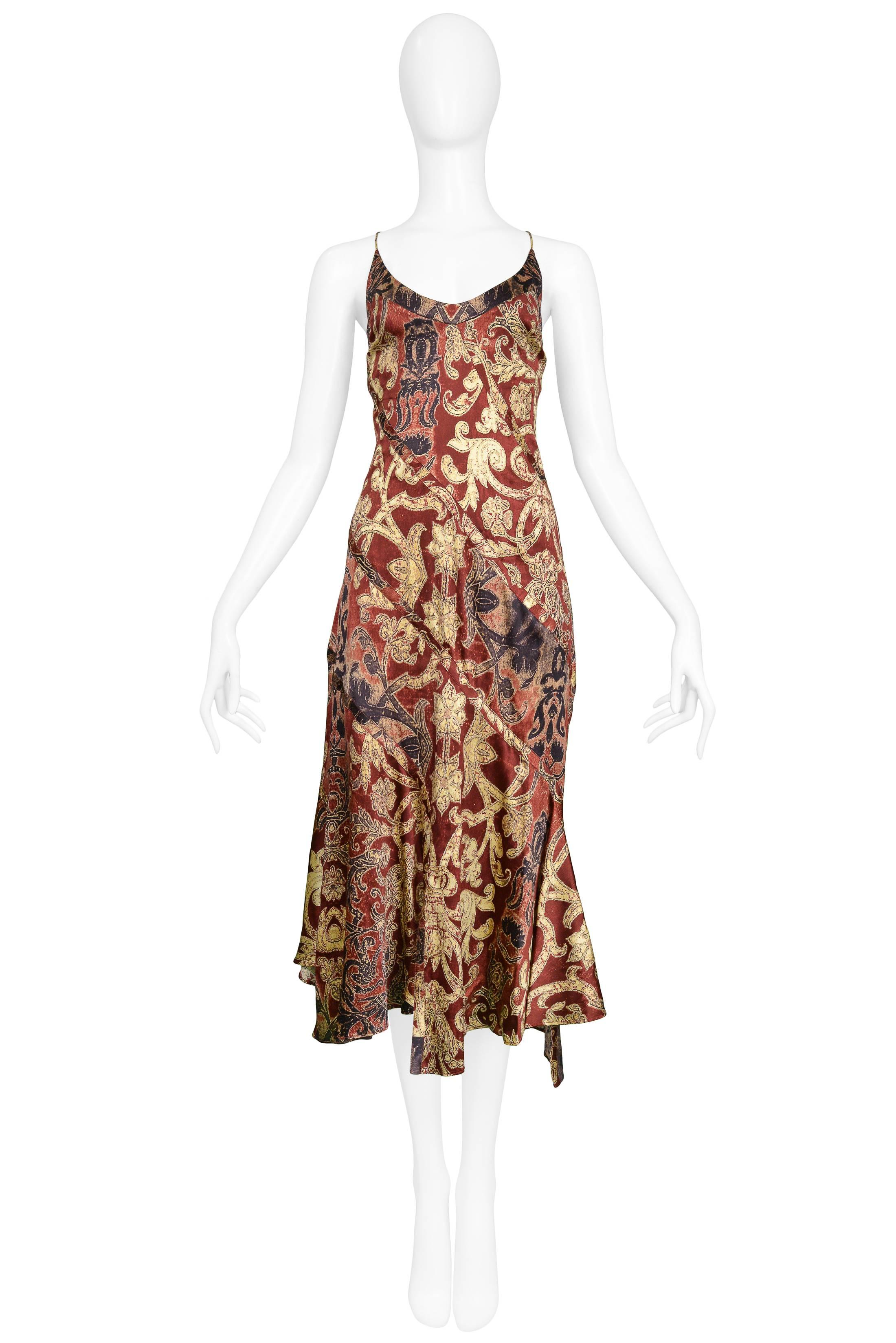 Vintage Roberto Cavalli burgundy and golden tone baroque print satin slip dress with bias cut, spaghetti straps, and open back. 

Excellent Condition. 

Size: Small
