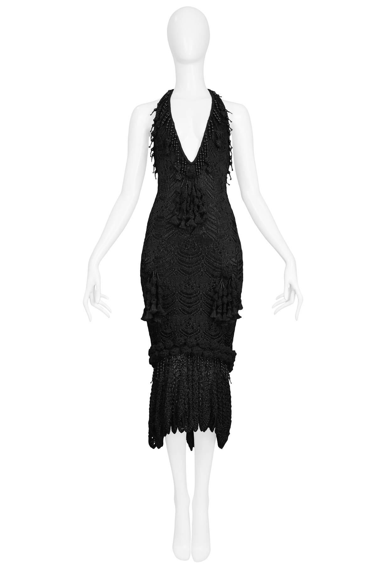 Vintage John Galliano black cotton silk blend crochet backless dress with halter plunge neckline, beaded tassel detail throughout & fishtail hem. 

Condition: New with tags; Never worn.

Size: Medium.