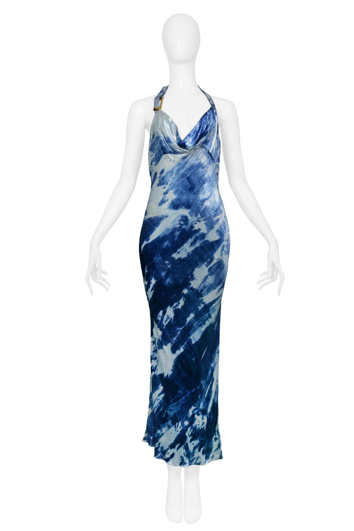 John Galliano for Christian Dior blue & white velvet bias-cut halter gown featuring an open back, draped neckline, side slit, and halter straps adorned with belt buckle detail. From the 2001 Collection.

Excellent Condition.

Size: 38
