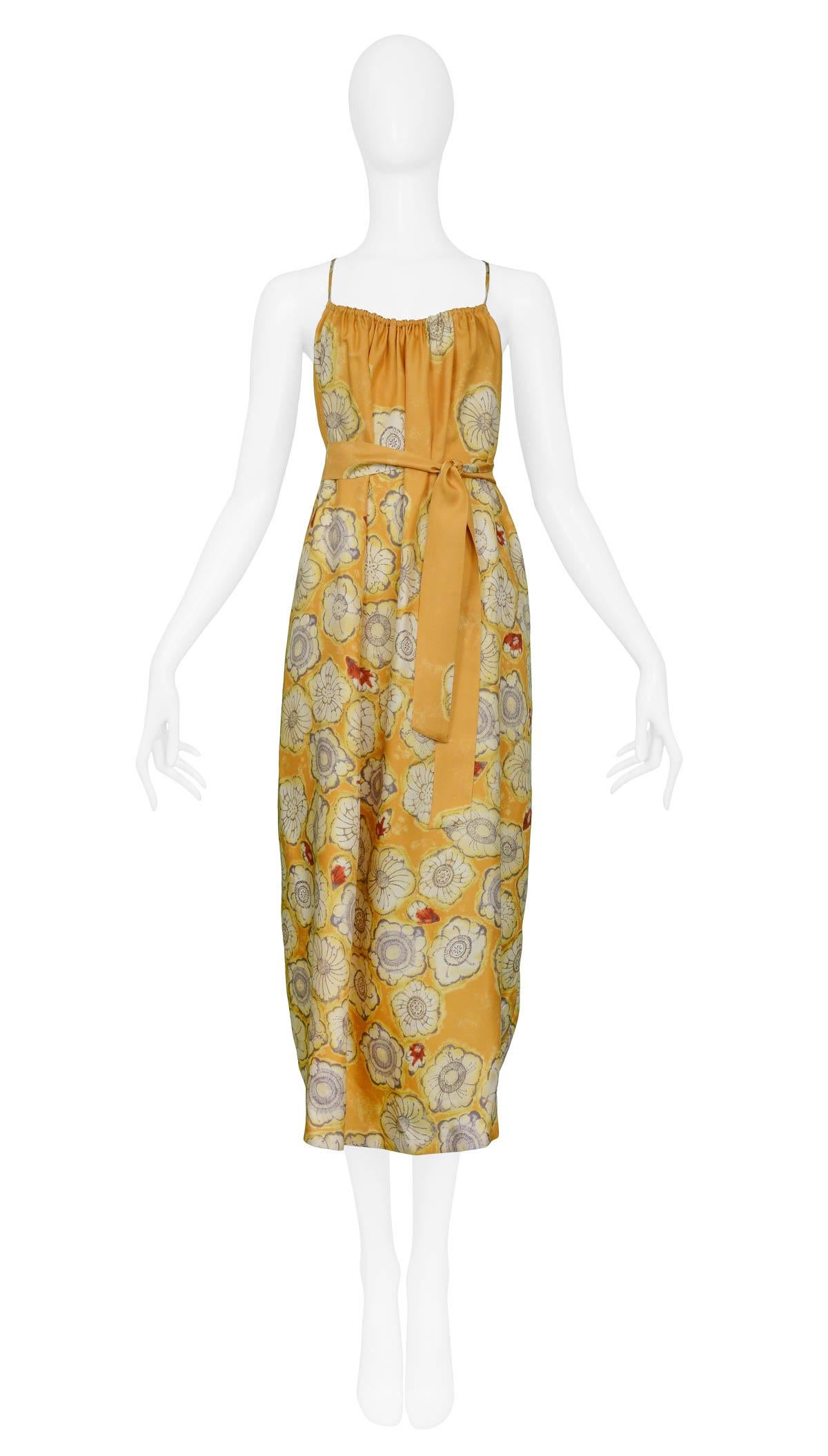 Vintage Dries Van Noten mustard yellow floral slip dress with waist sash & criss-cross back strap detail.

Excellent Condition.

Size: 40