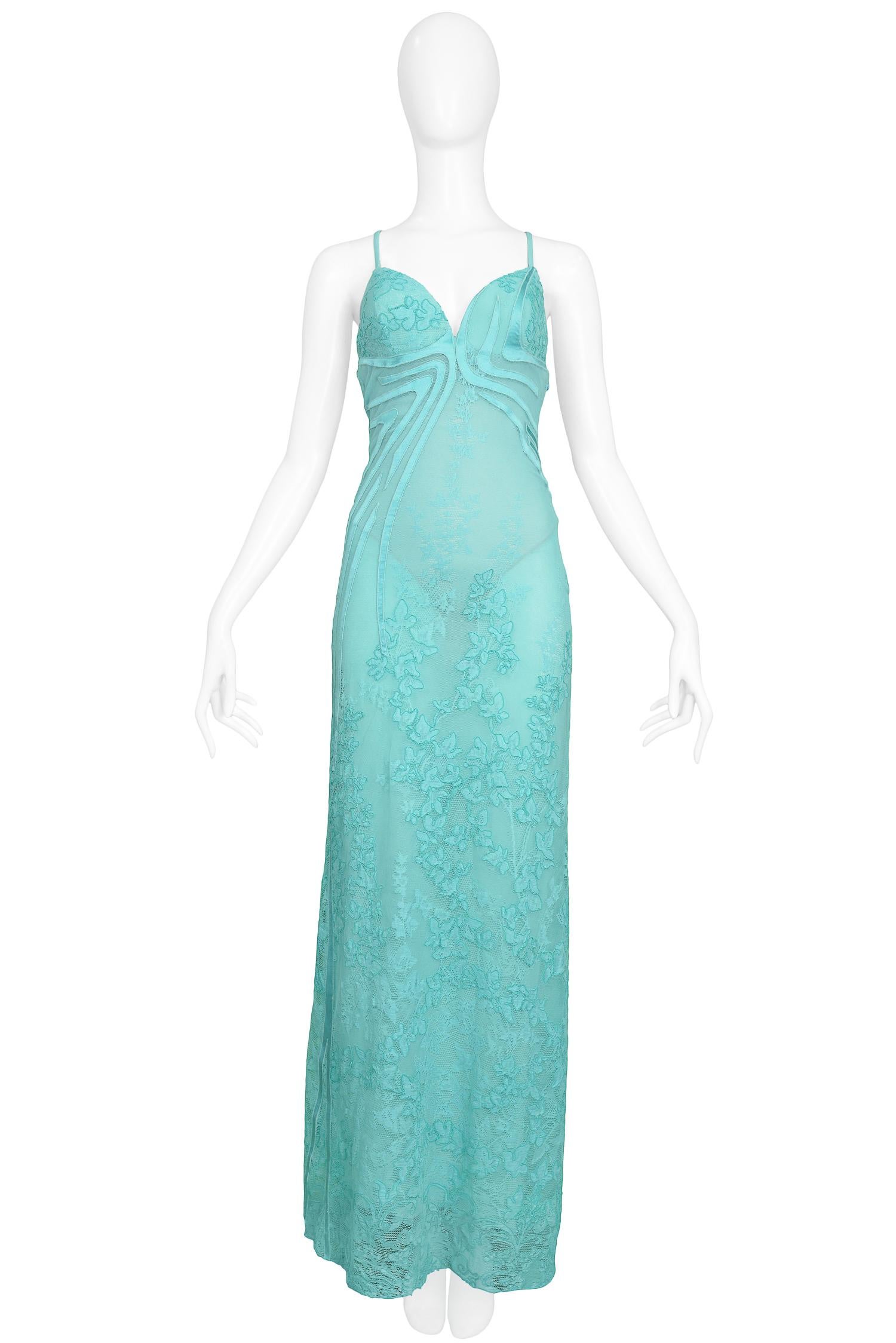 Vintage Versace seafoam green mesh & lace gown with abstract satin appliqué and delicate criss-cross straps at back. The gown features a georgette slip underlay as well as a built-in leotard and bra. Worn by Gisele on the Autumn/Winter 2000