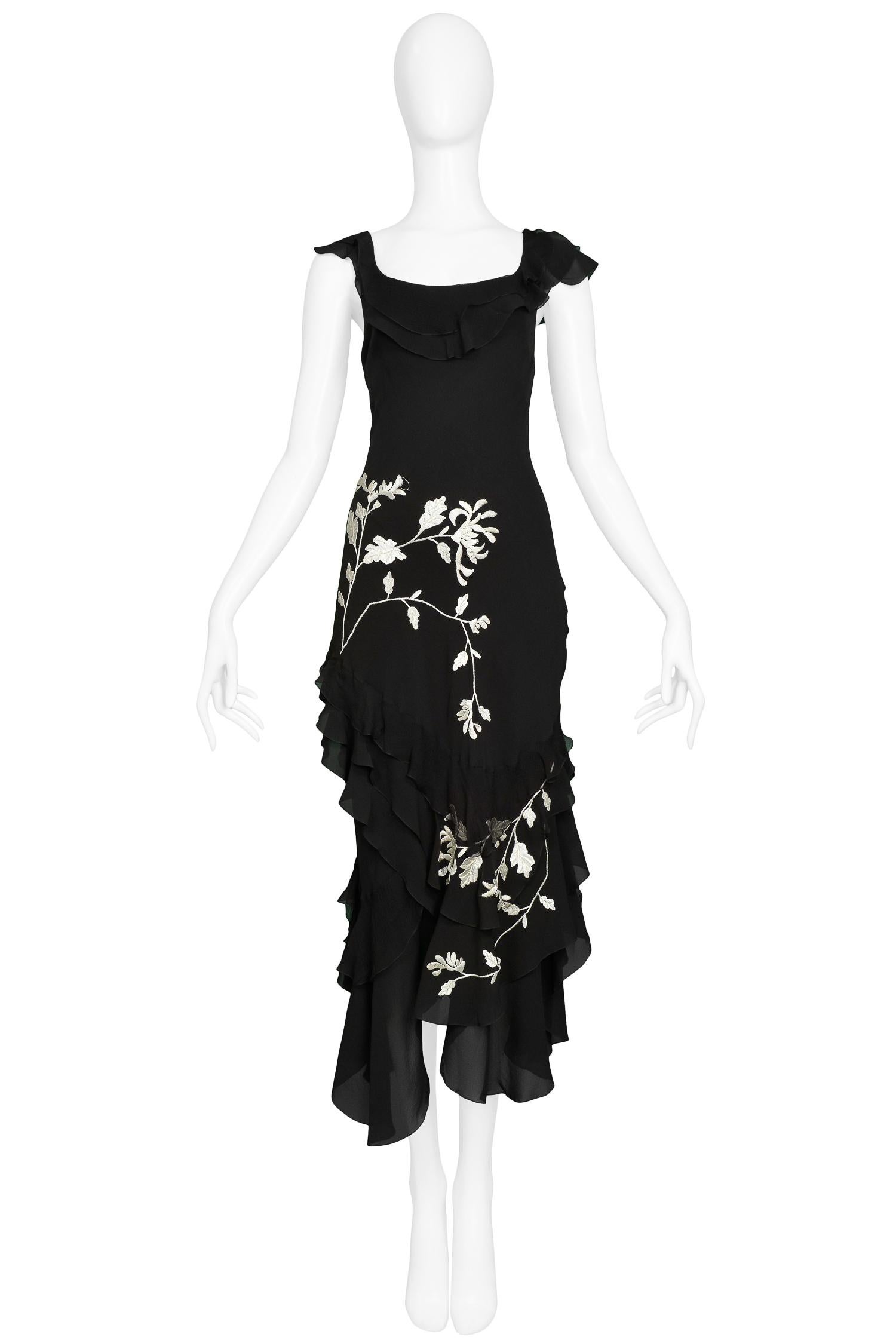Vintage John Galliano black silk chiffon bias slip dress with white floral embroidery, ruffle hem, neckline & sleeves.

Excellent Condition.

Size: 38

Measurements:
Bust 32
