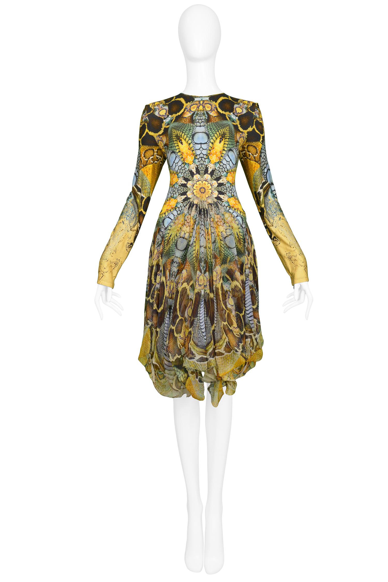 Vintage Alexander McQueen Plato's Atlantis jersey dress featuring an allover multi-color reptile scale print, long fitted sleeves & asymmetrical hem with chiffon insets. An example from the memorable Spring/Summer 2010 Collection

Excellent