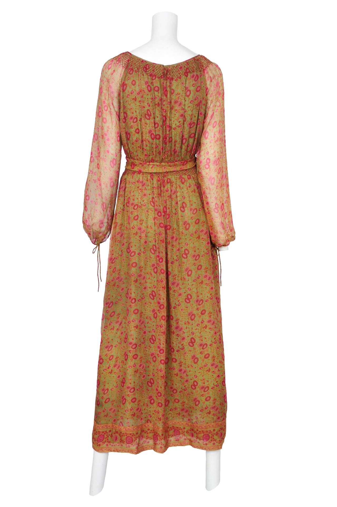 Vintage Treacy Lowe olive green silk chiffon peasant dress featuring a pink & berry floral print and smocking at neckline and waist band.