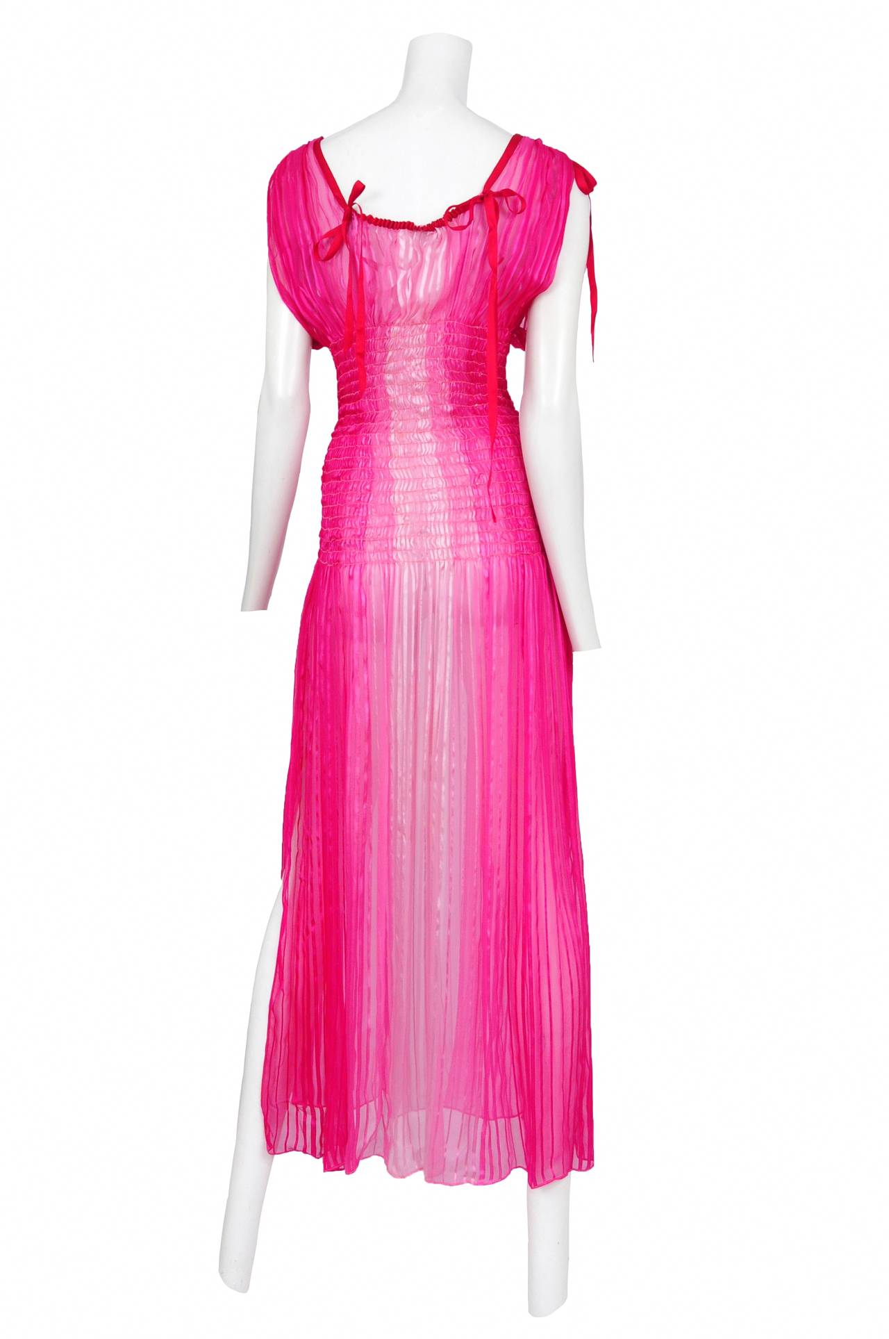 Vintage Yves Saint Laurent fuchsia ombre silk chiffon maxi dress featuring berry color ribbon trim at neckline that gathers across the chest with bows at either side. The same ribbon gathers shoulder fabric together and keeps it gathered with a bow