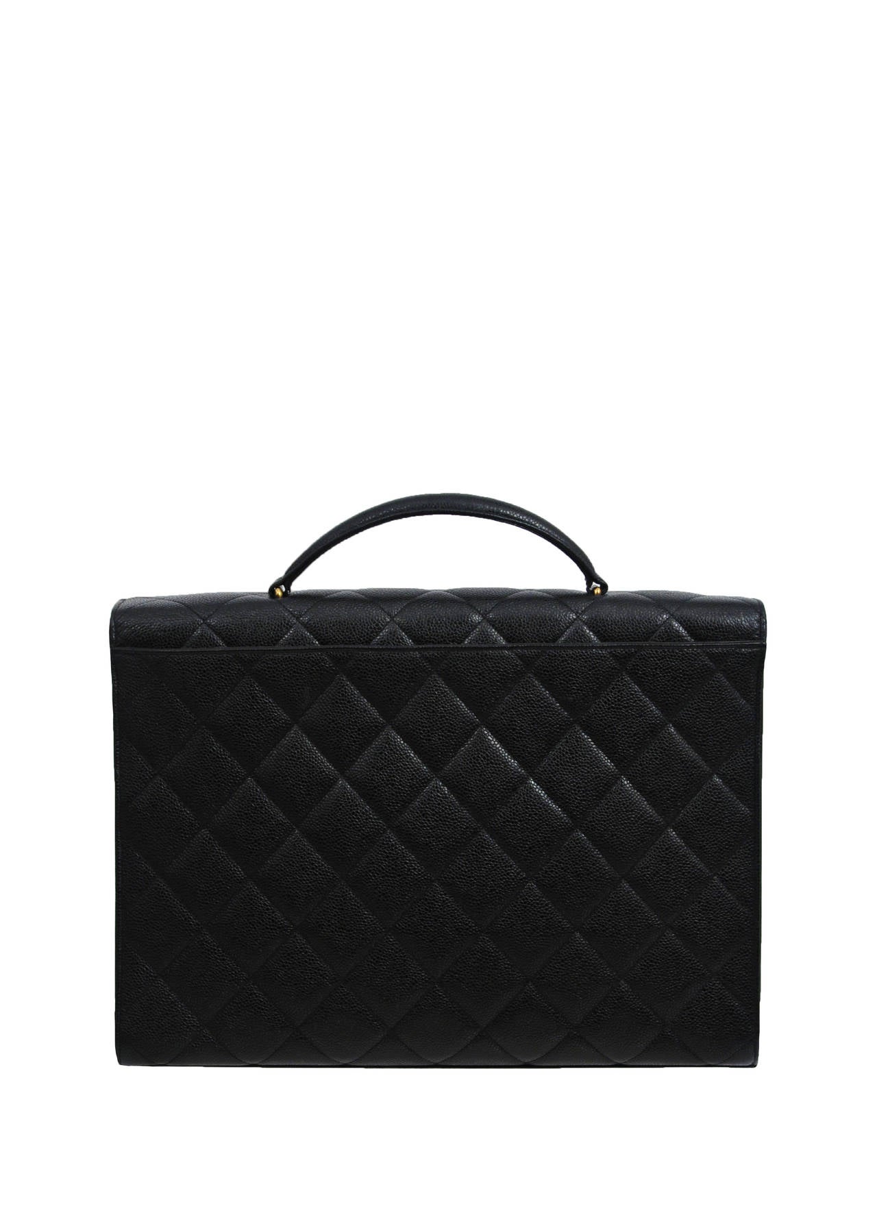 Vintage Chanel black caviar leather laptop bag. Comes with hologram sticker. All of our vintage designer luxury bags are guaranteed to be 100% authentic and original.