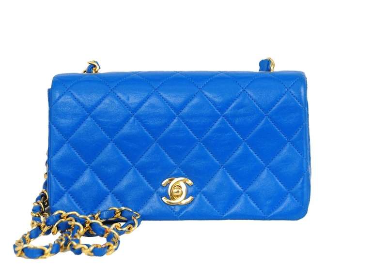 Bright Teal blue quilted leather mini 3 way with gold hardware.