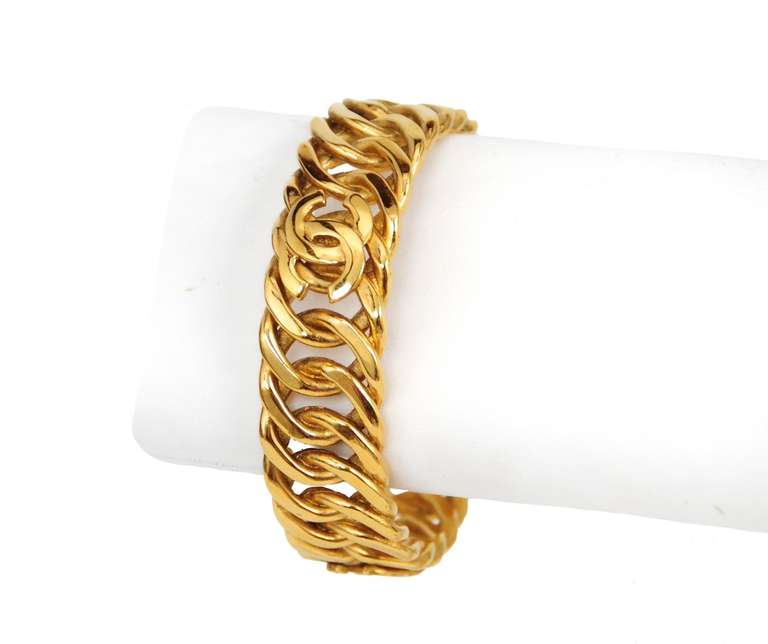 Gold link bracelet with CC logo hardware.