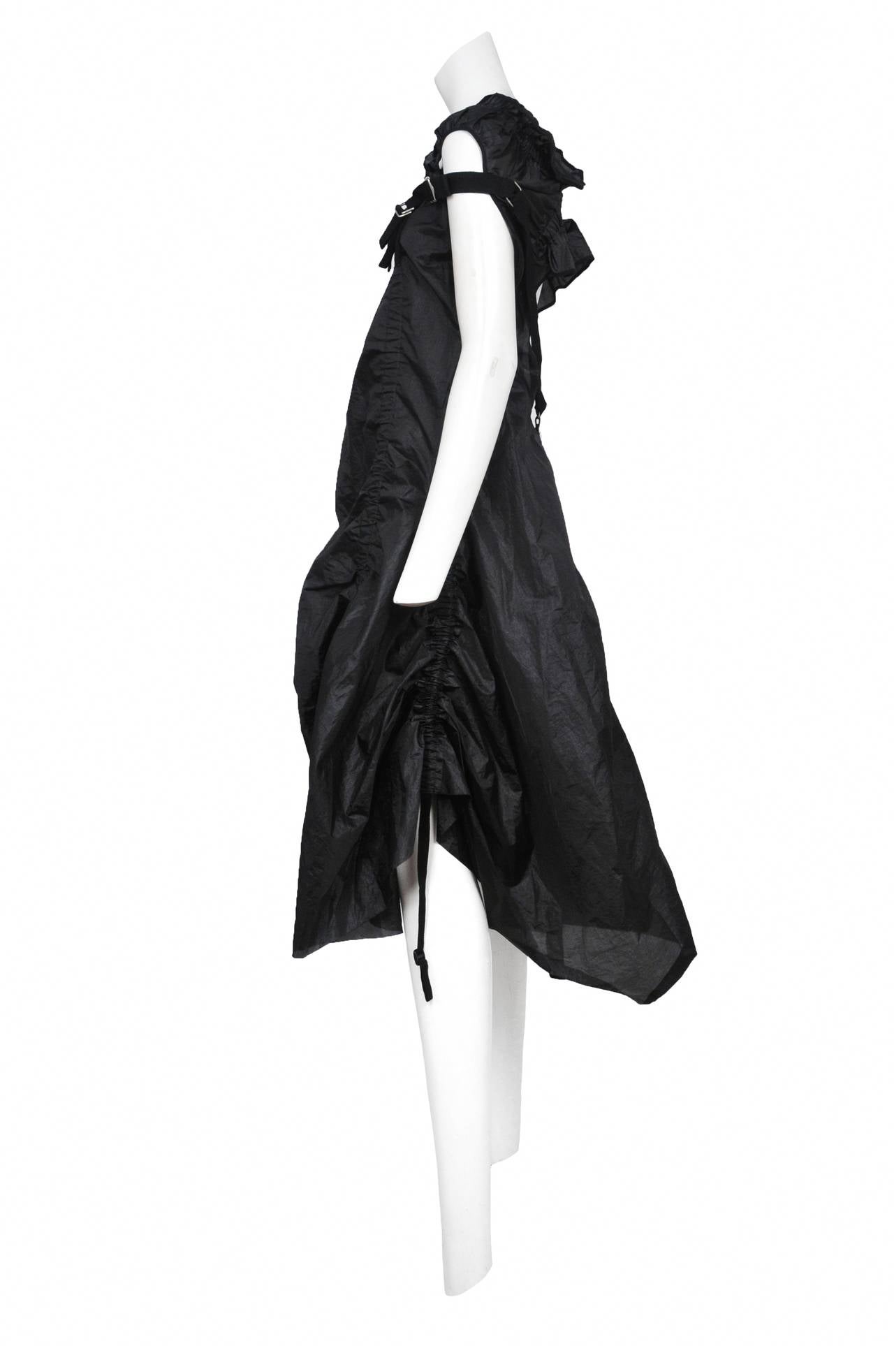 Vintage Junya Watanabe for Comme des Garcons black parachute dress with black belt and buckle detailing throughout, . Circa 2002.