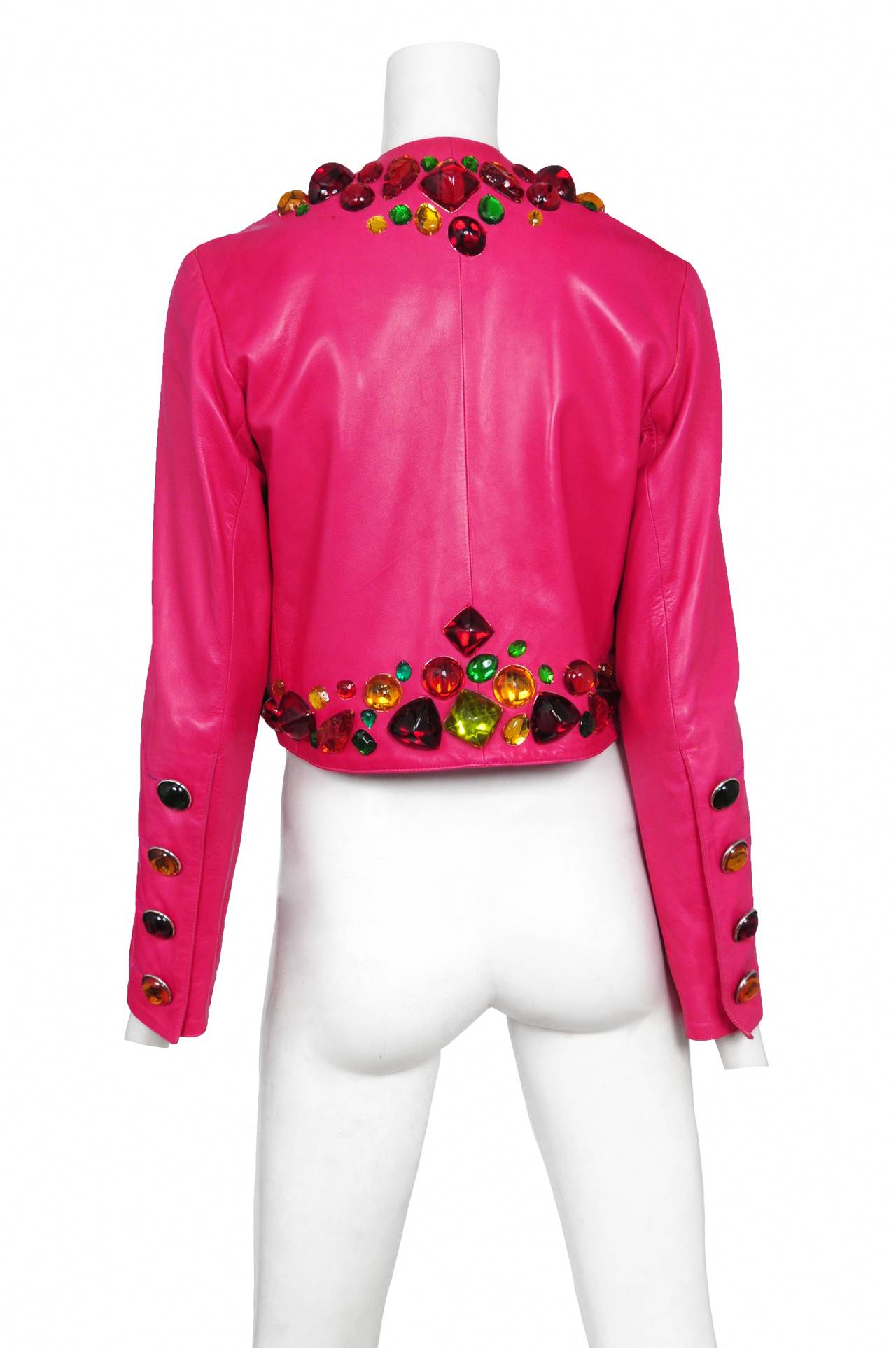 Vintage Yves Saint Laurent subtle leather jacket in vibrant pink with multi color  oversized acrylic gemstones at edges and cuffs.