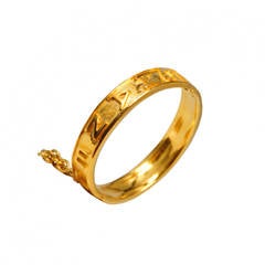 Chanel Gold Embossed Bangle