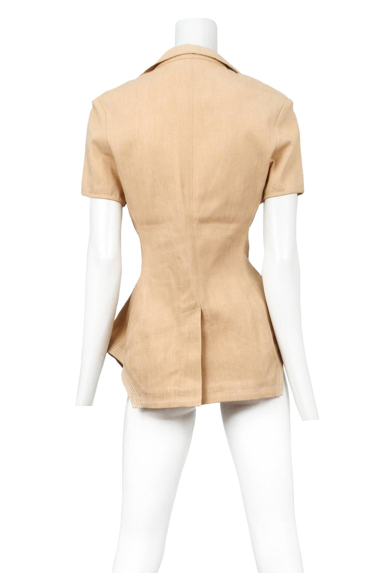 Vintage Yohji Yamamoto natural colored short sleeve architectural top featuring a flap collar, back vent and hidden lace inserts at the bust.