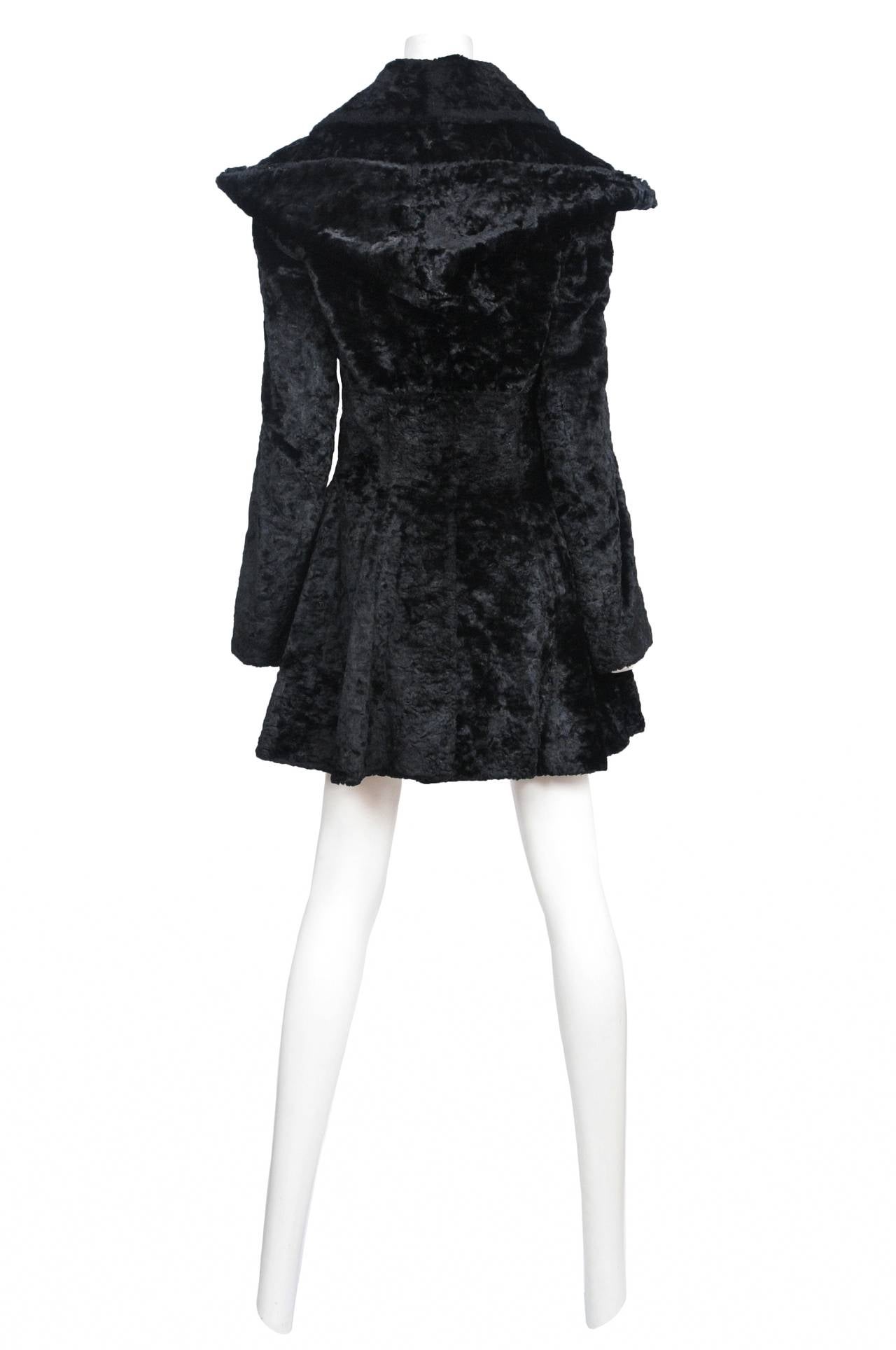 Vintage Azzedine Alaia black faux fur double breasted swing coat featuring a hooded collar.