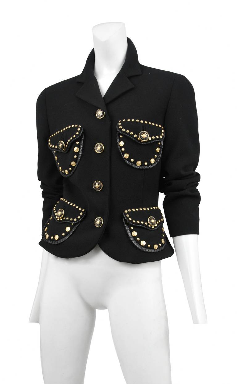 Black wool classic single breasted blazer with gold studded leather trim pockets.