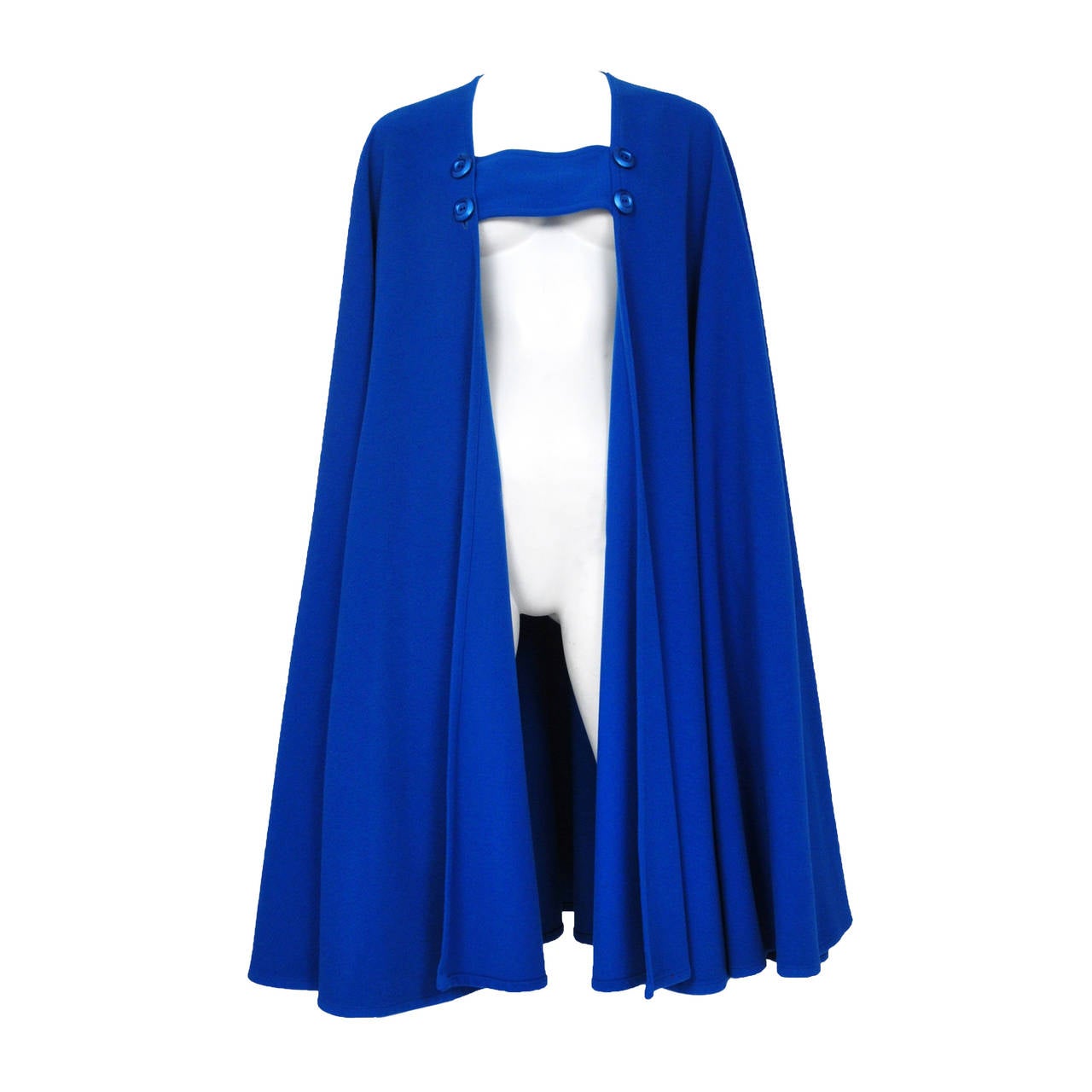 Vintage Yves Saint Laurent blue wool cape featuring a double button placket across the chest.