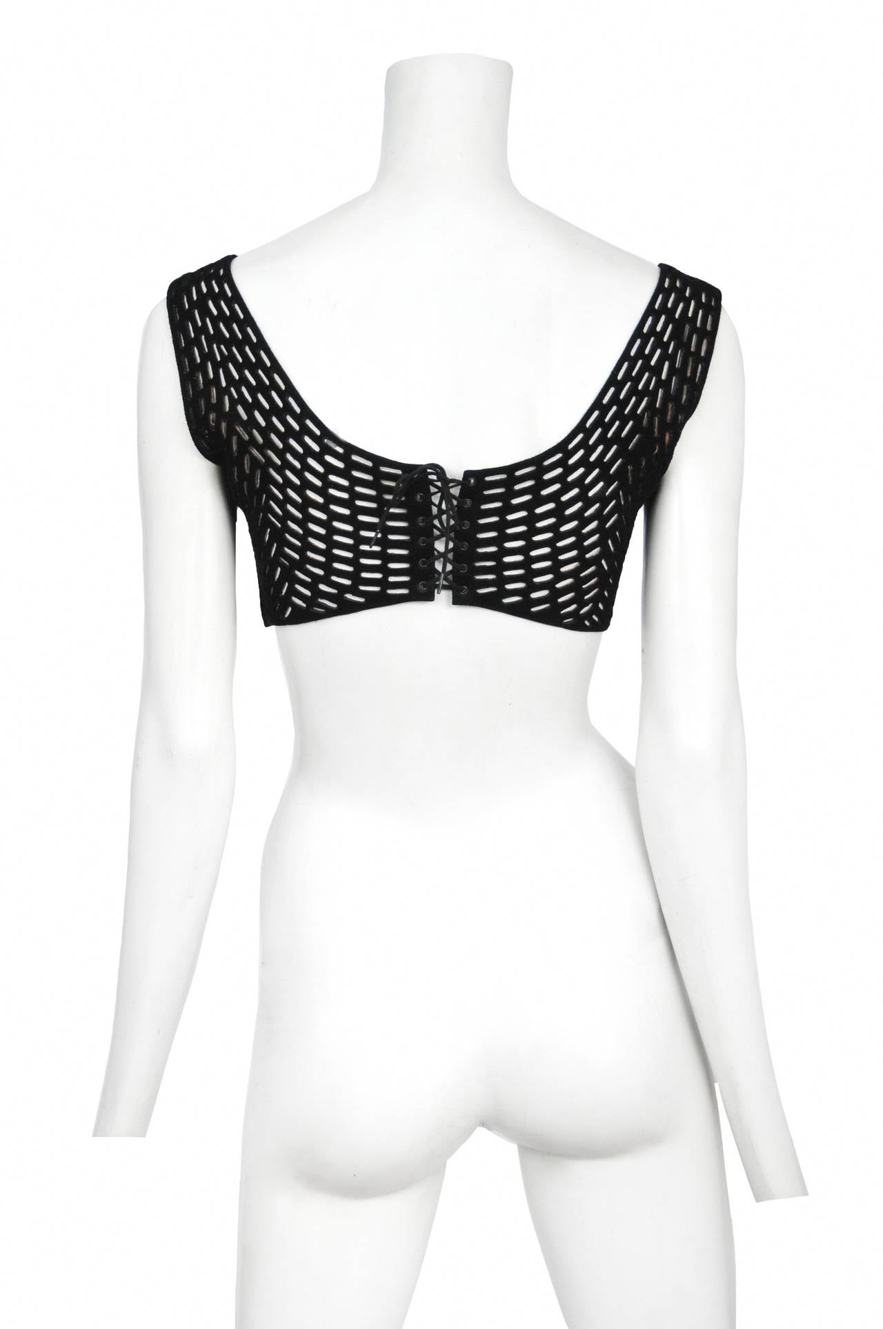 Vintage Azzedine Alaia black suede bra featuring an all over laser cutout design and lace up back.