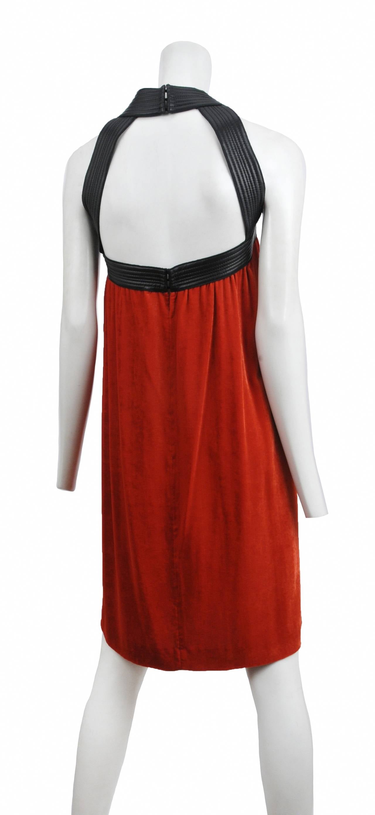 Future Classics. Jean Paul Gaultier red velvet dress with black leather yoke collar detail.