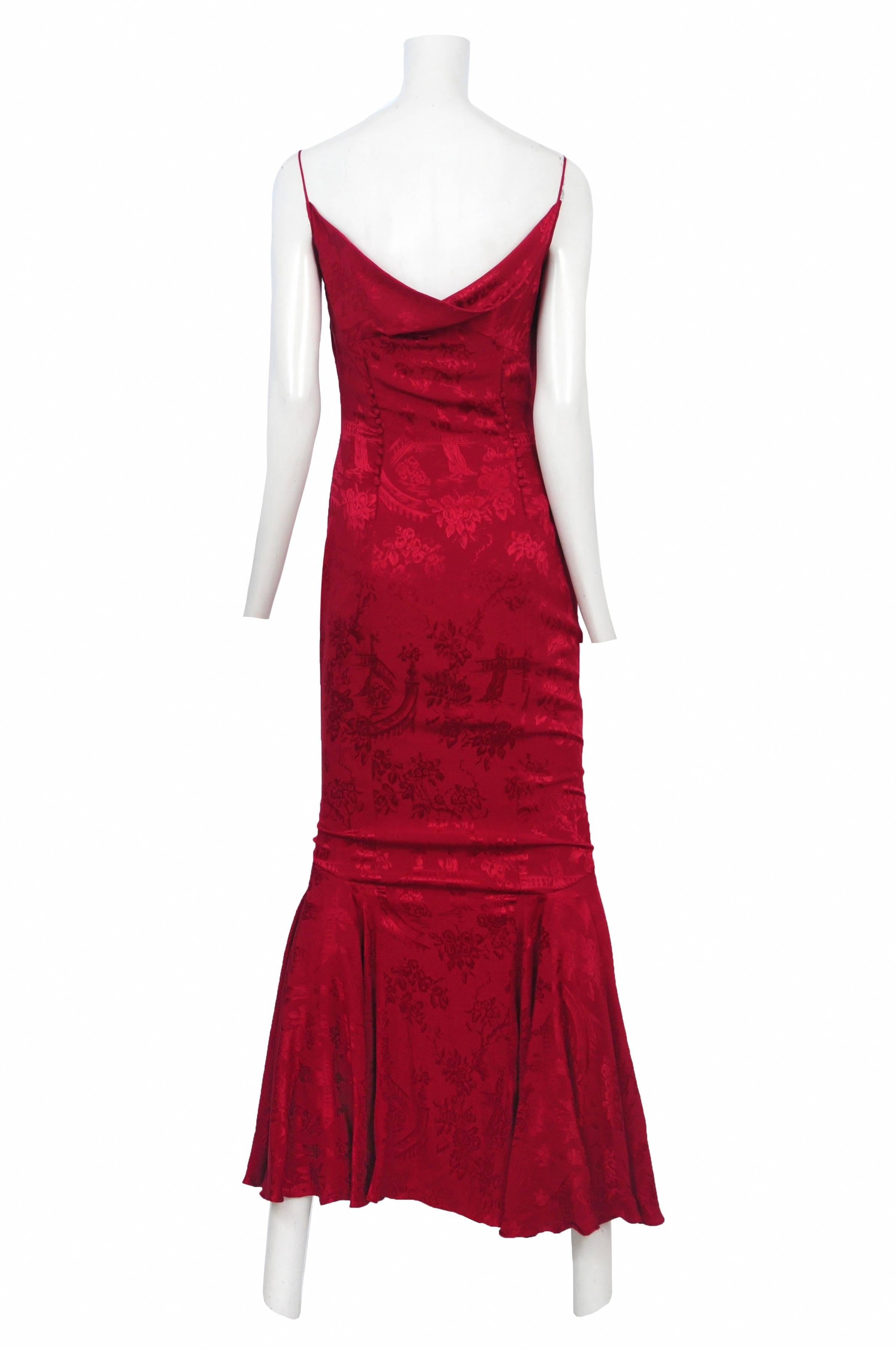 Vintage John Galliano red floral damask gown featuring spaghetti straps, a cowl at the front bust and godets at the hem. 