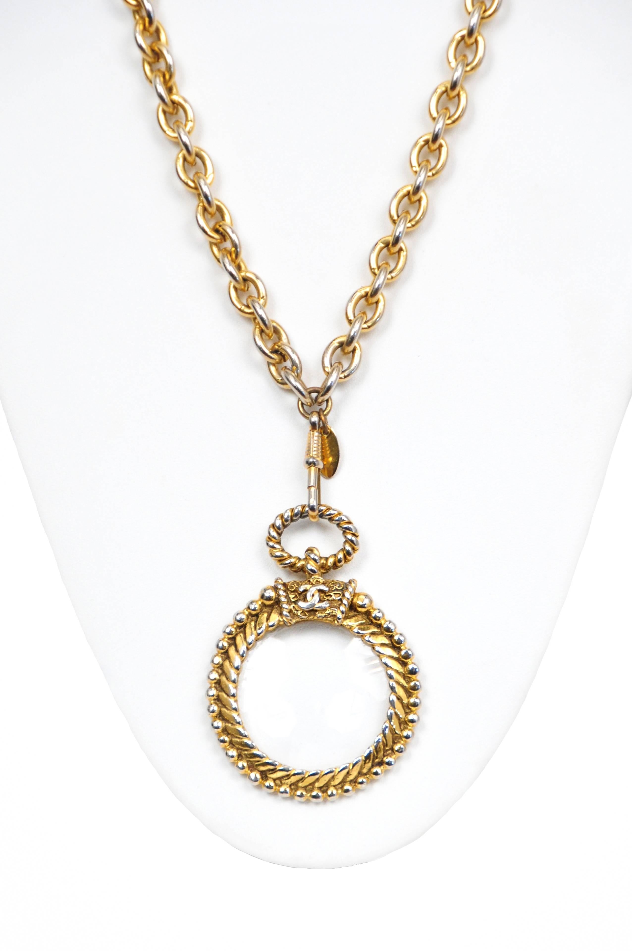 Vintage Chanel gold monocle necklace featuring the CC logo. 