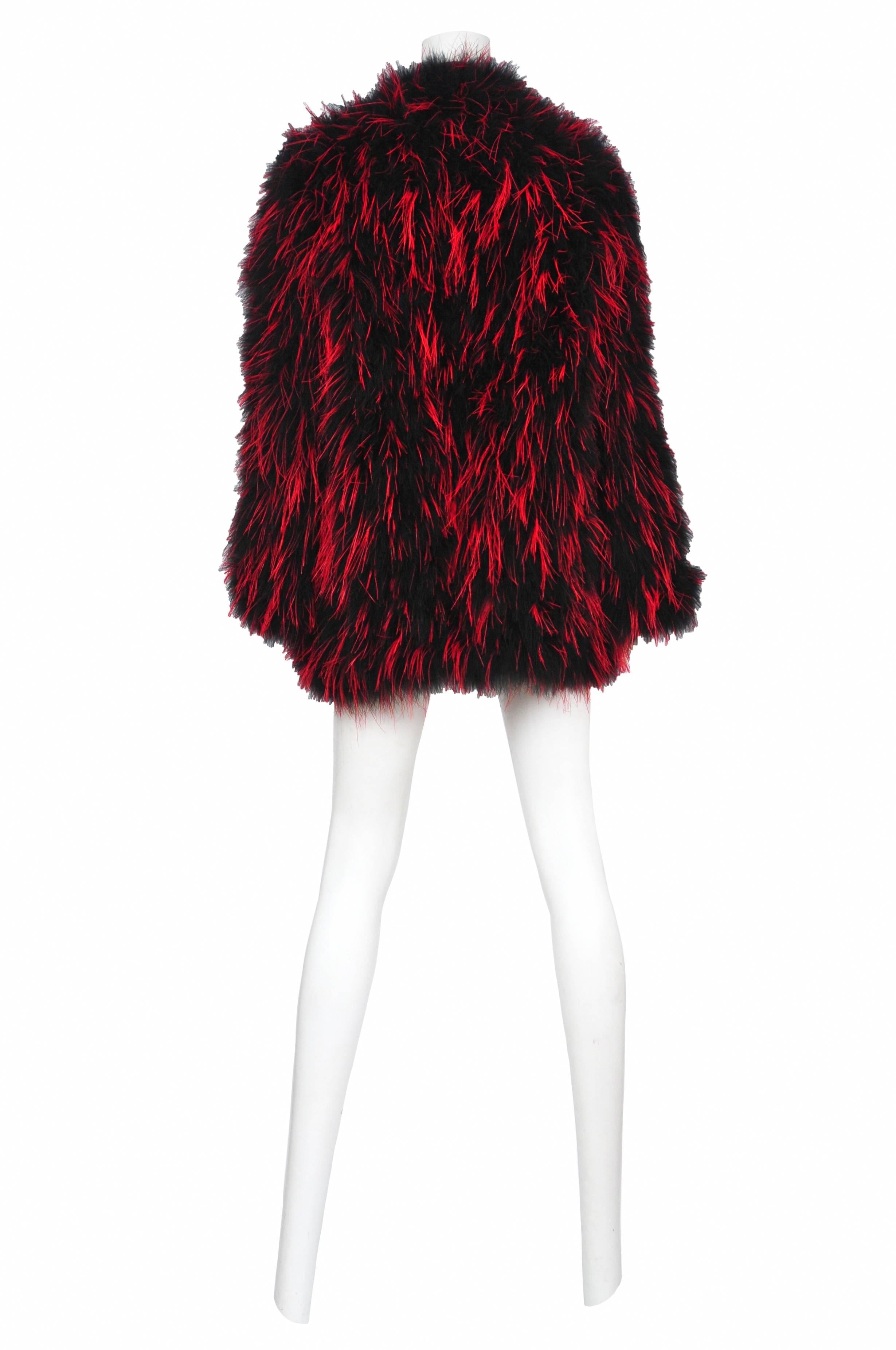Vintage Yves Saint Laurent iconic chubby featuring black and red marabou feathers.