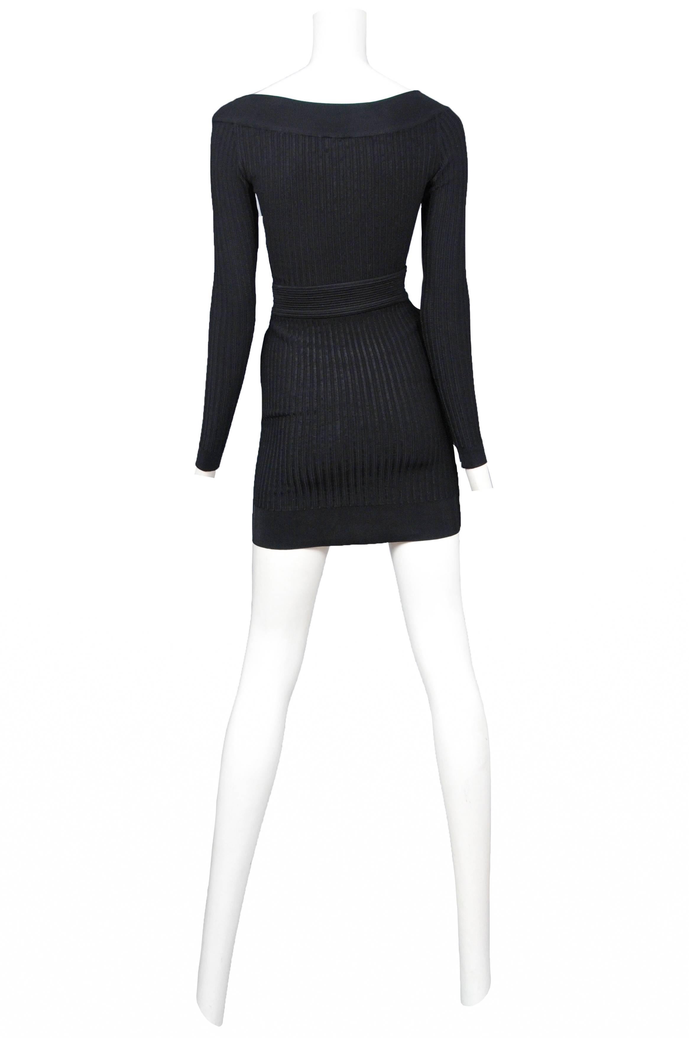 Vintage Azzedine Alaia black ribbed knit scoop neck long sleeve bodysuit and matching mini skirt. 

Skirt is marked a size small, Bodysuit is marked a size medium 