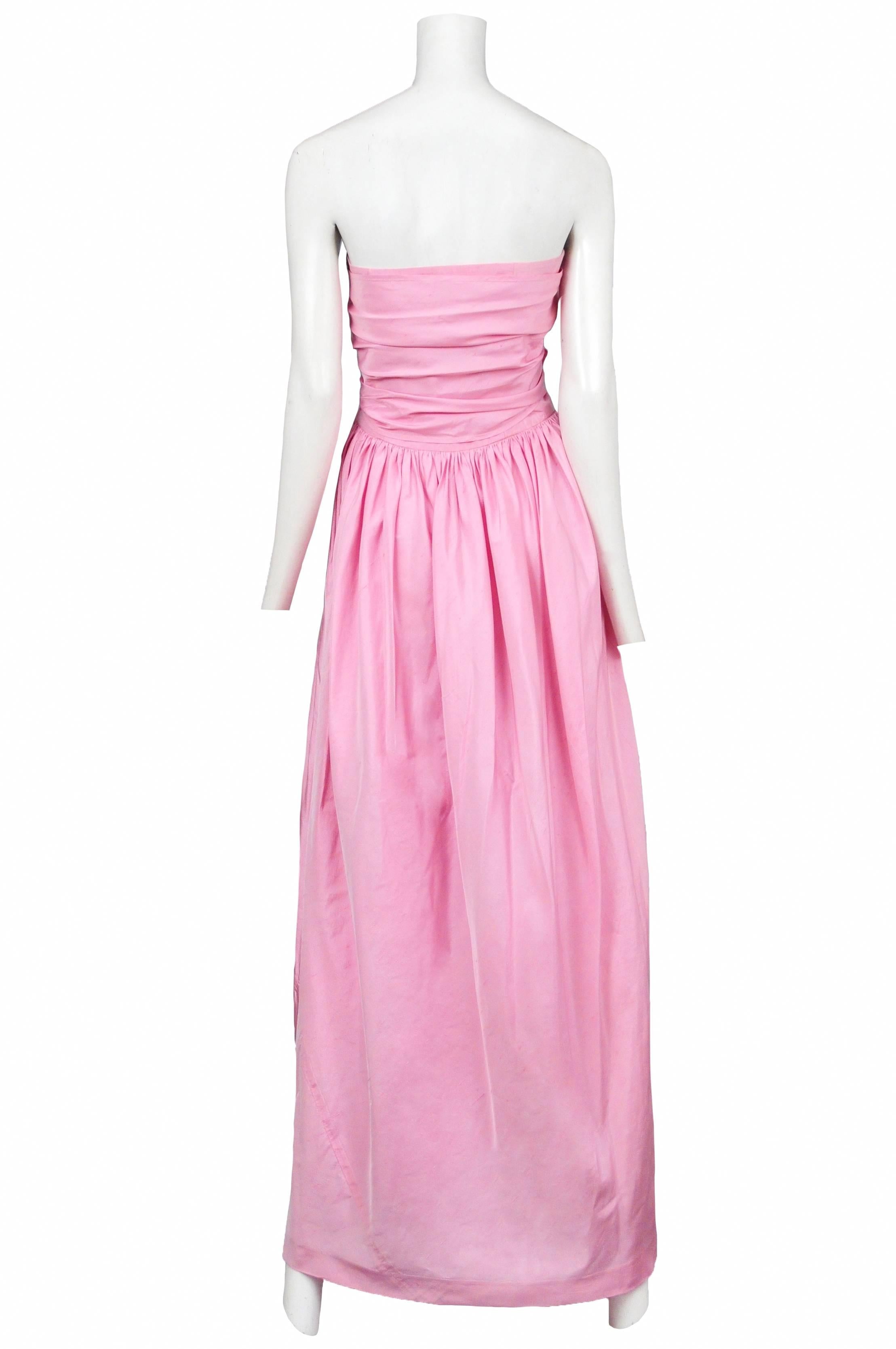 Vintage Lanvin pink taffeta strapless gown featuring a gathered waist and a large tied bow at the bust. 