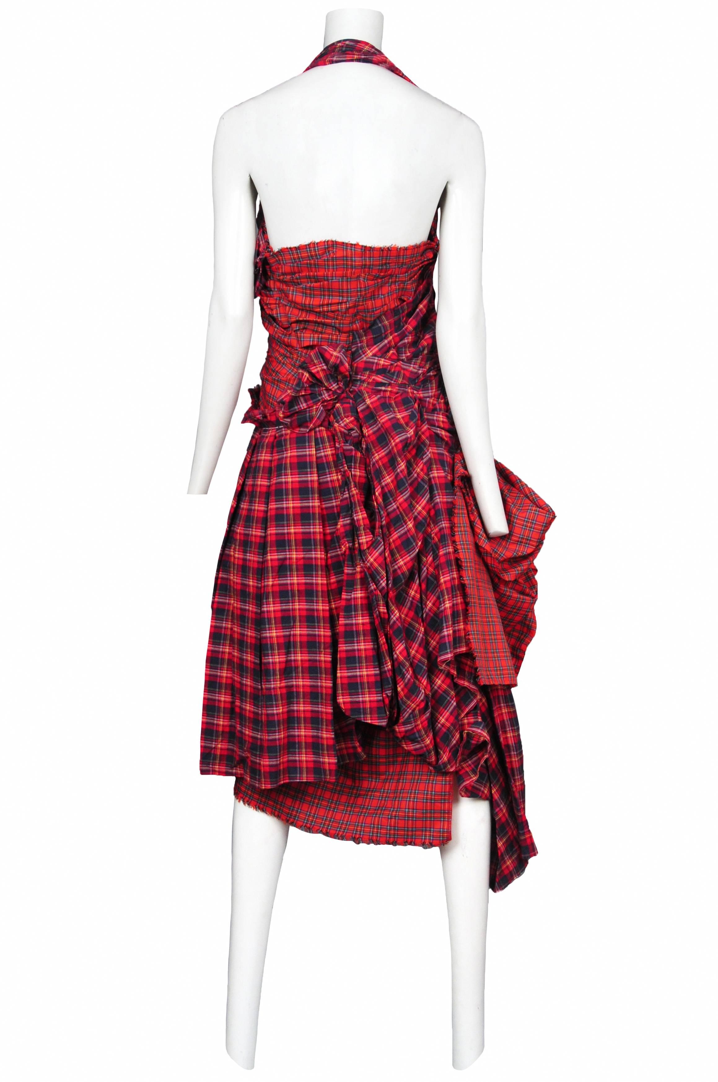 Vintage Comme des Garcons halter style party dress featuring raw edges and uses a mix of various red plaids that are intricately gathered at the back and along the side of the torso. Circa 2005. Please contact for additional photos.