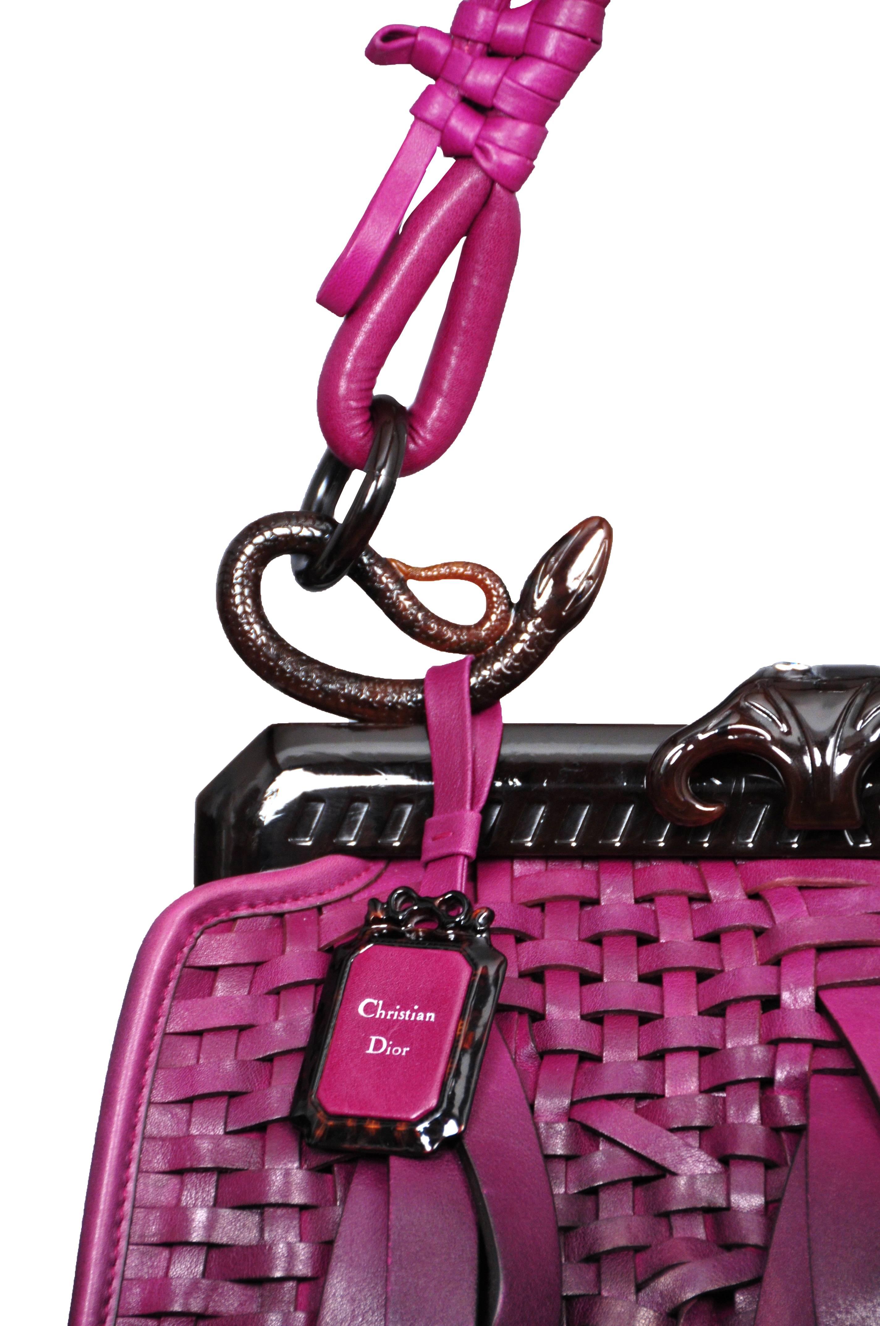 Vintage John Galliano for Christian Dior ombre magenta leather Samourai 1947 bag made to commemorate Christian Dior's 60th anniversary. This limited edition bag features a basket weave texture throughout, carved snake hooks at the base of the