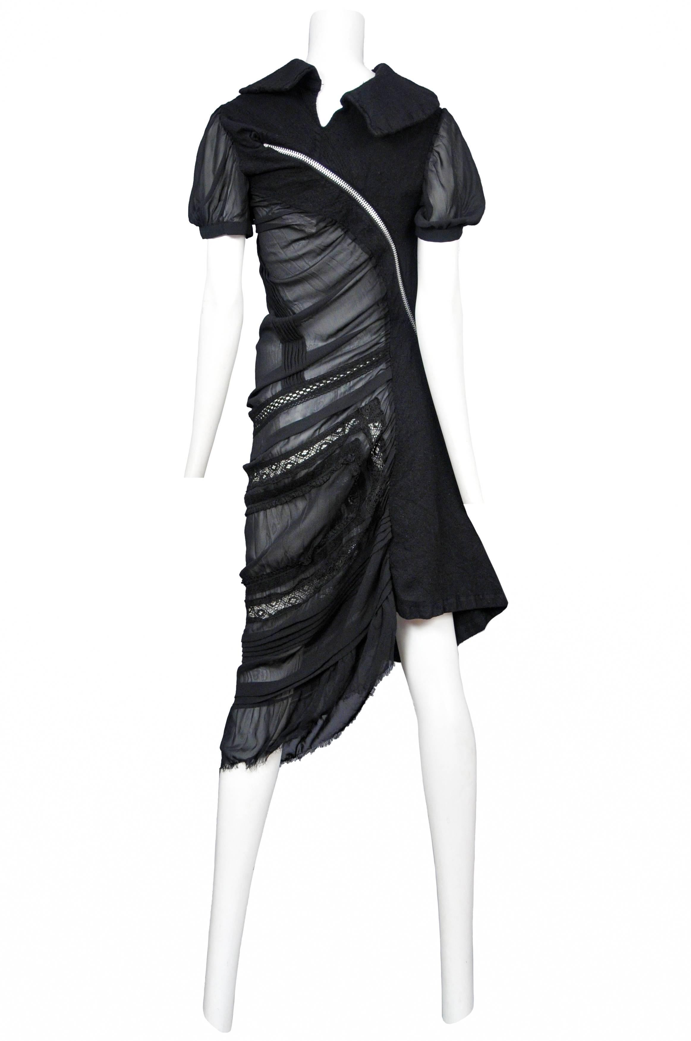 Vintage Junya Watanabe black chiffon twist dress featuring lace insets at the skirt, a button up collar and a black wool inset and zipper at the back. Circa 2007. 
