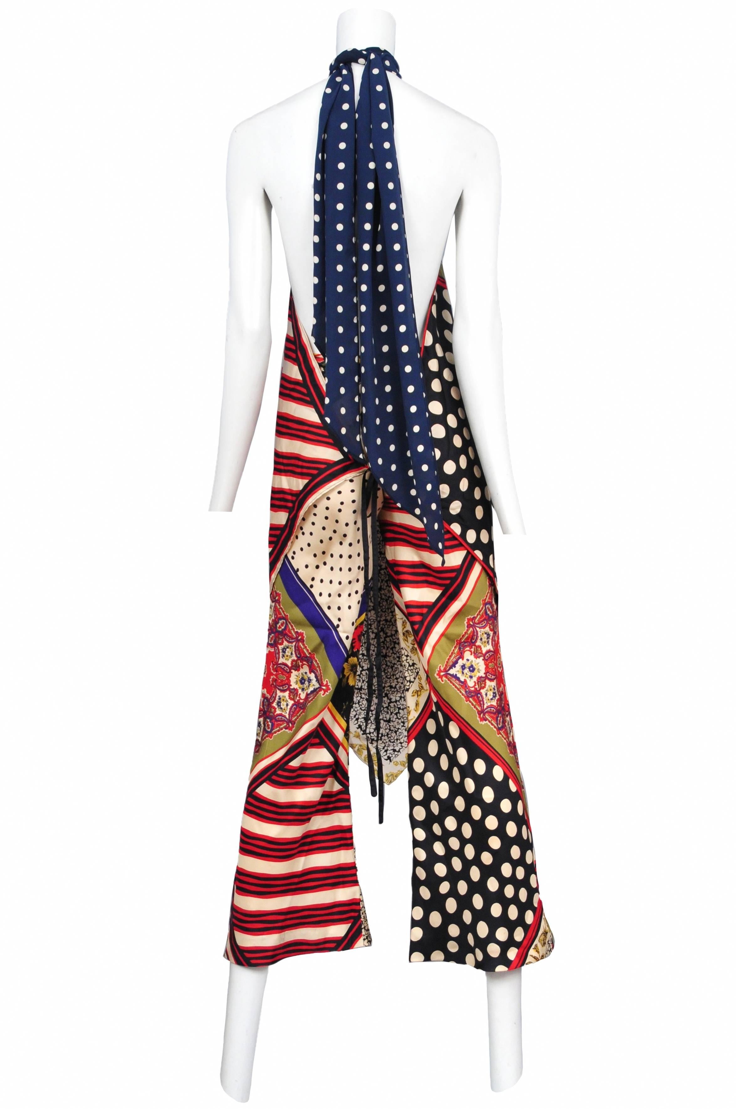 Vintage Jean Paul Gaultier multicolor scarf print ensemble featuring a halter style open back, tunic top featuring a scarf tie closure at the back neck and a pointed scarf shaped hem. The ensemble comes with matching printed pajama pants.