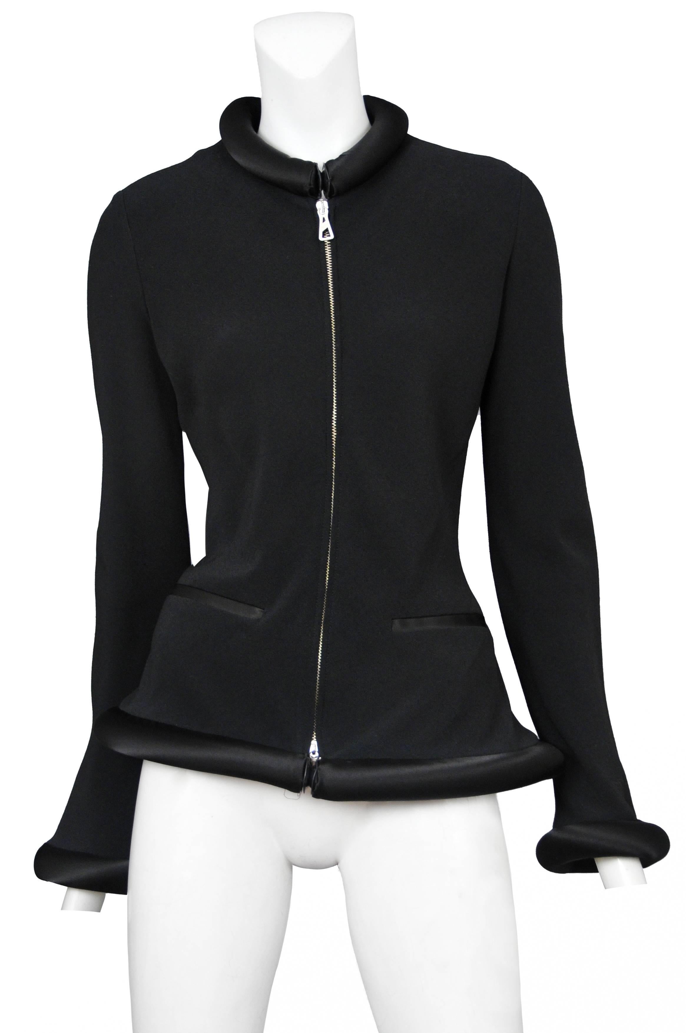 Vintage Jean Paul Gaultier black zipper front jacket featuring black satin tubing around the collar, cuffs and hem.
