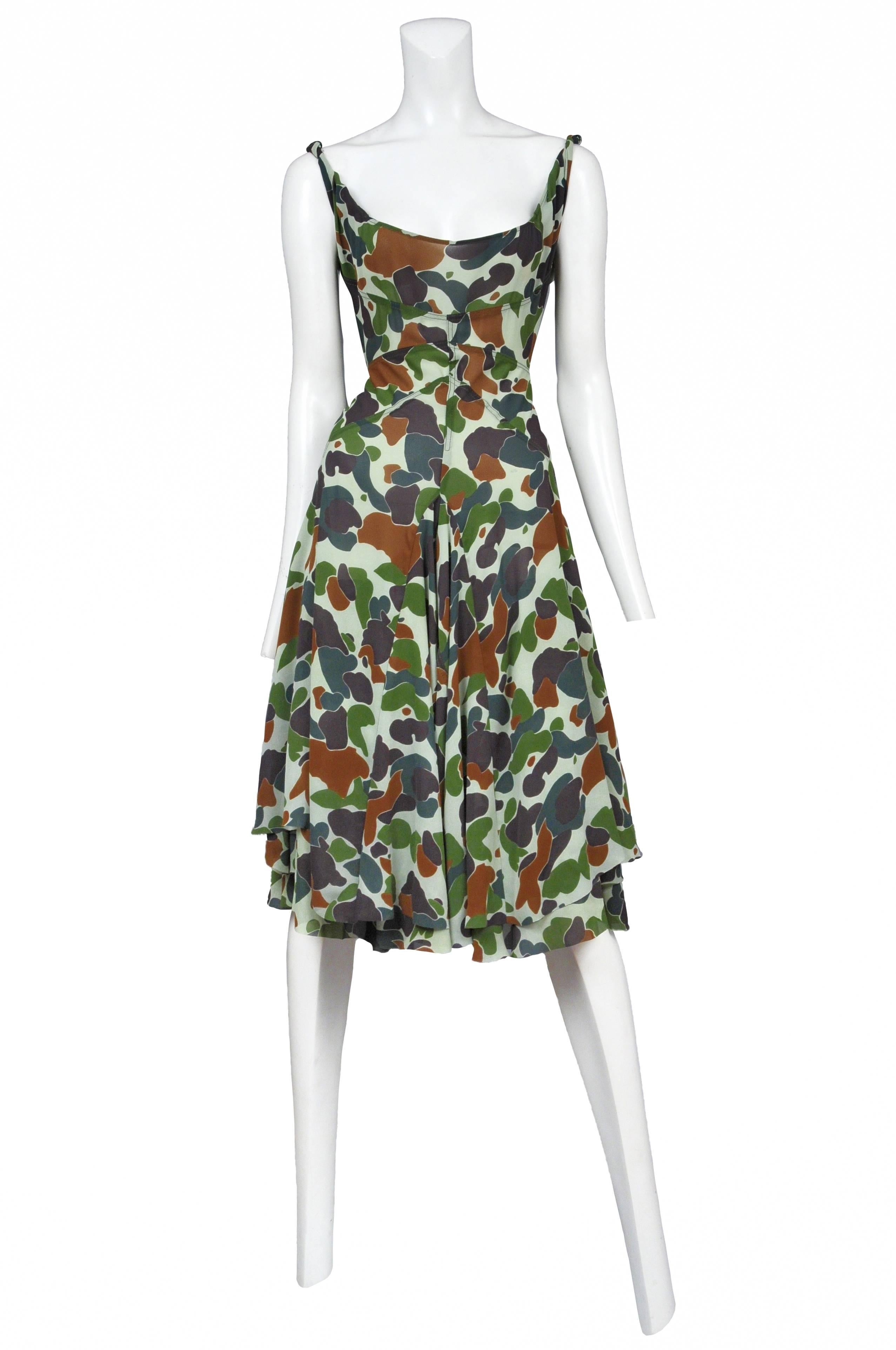 Junya Wantanabe sheer camouflage print structured dress with high hem swing skirt. 