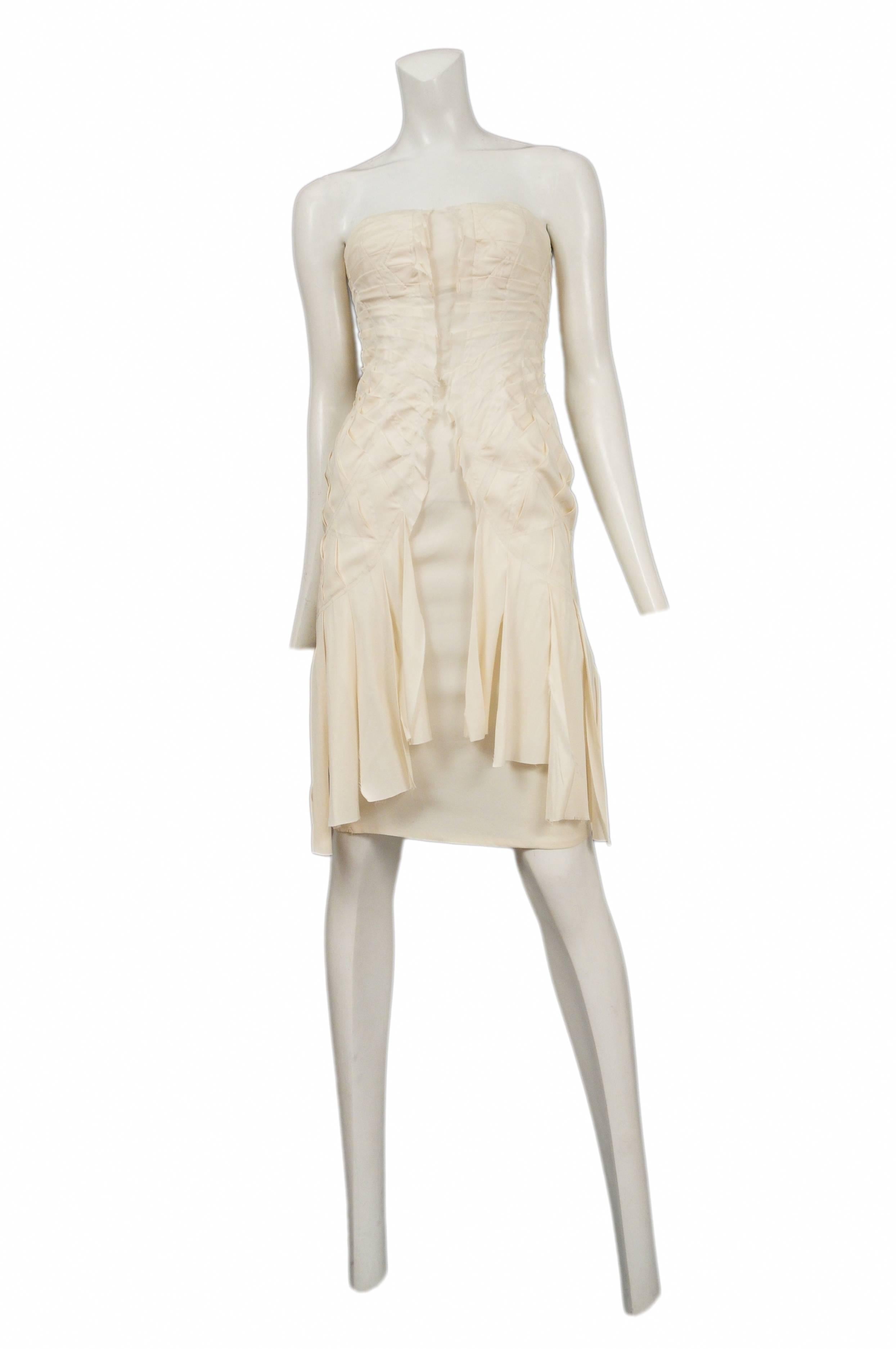 Tom Ford for Gucci cream silk strapless dress with structured pleating and unfinished hem detail. Circa 2004


